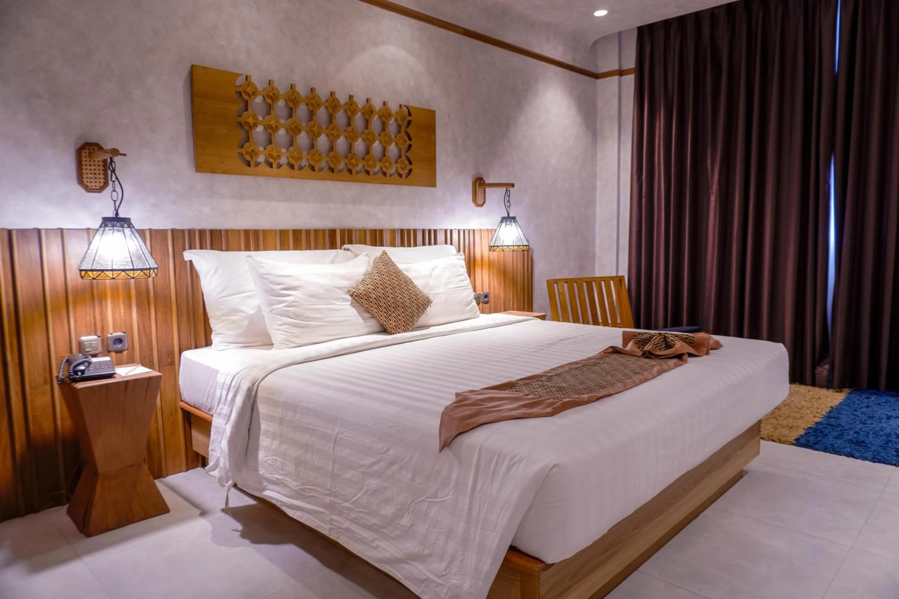 Bed in de JAVA Hotel Bandung