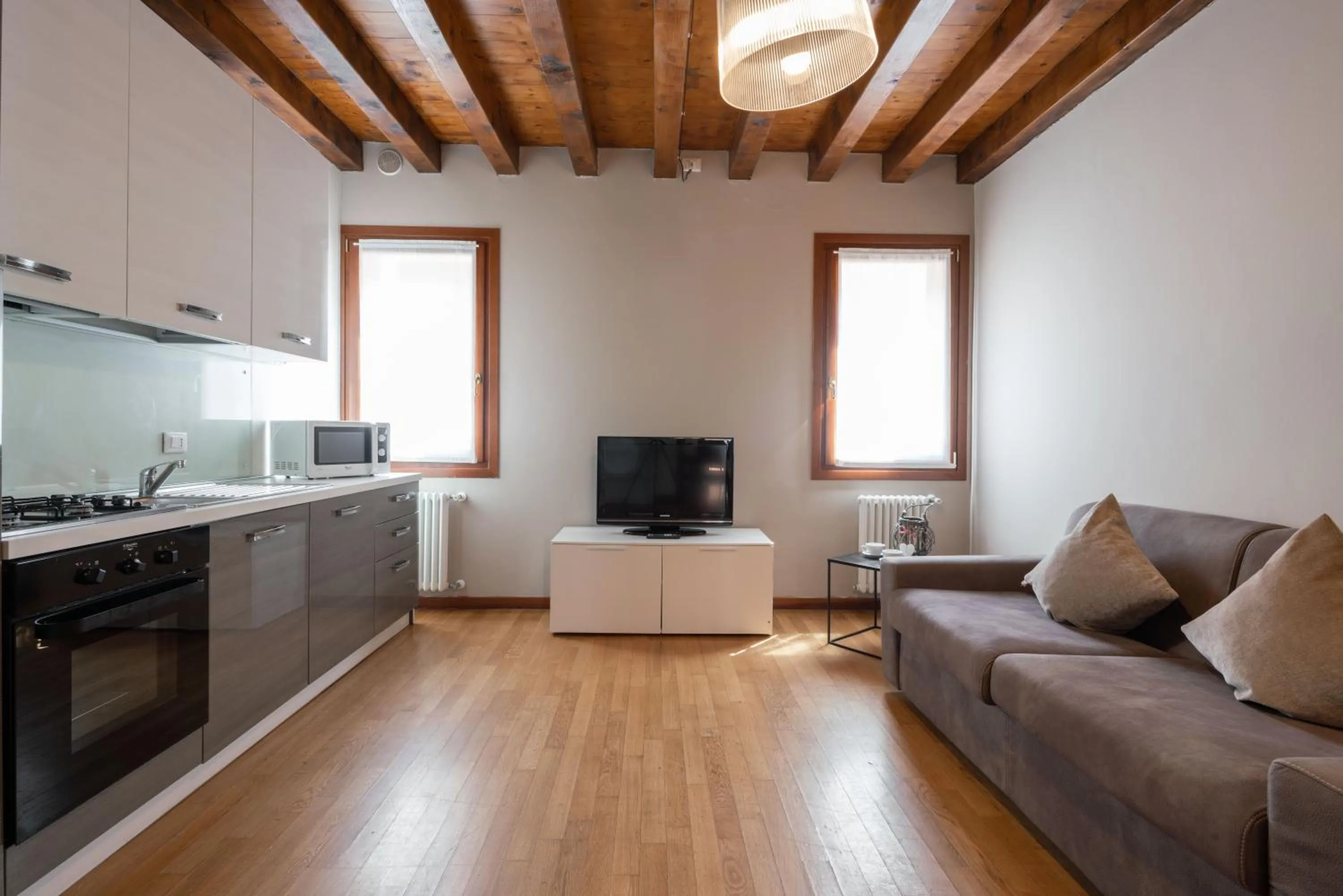 Kitchen or kitchenette in Design Palace Apartment by Wonderful Italy