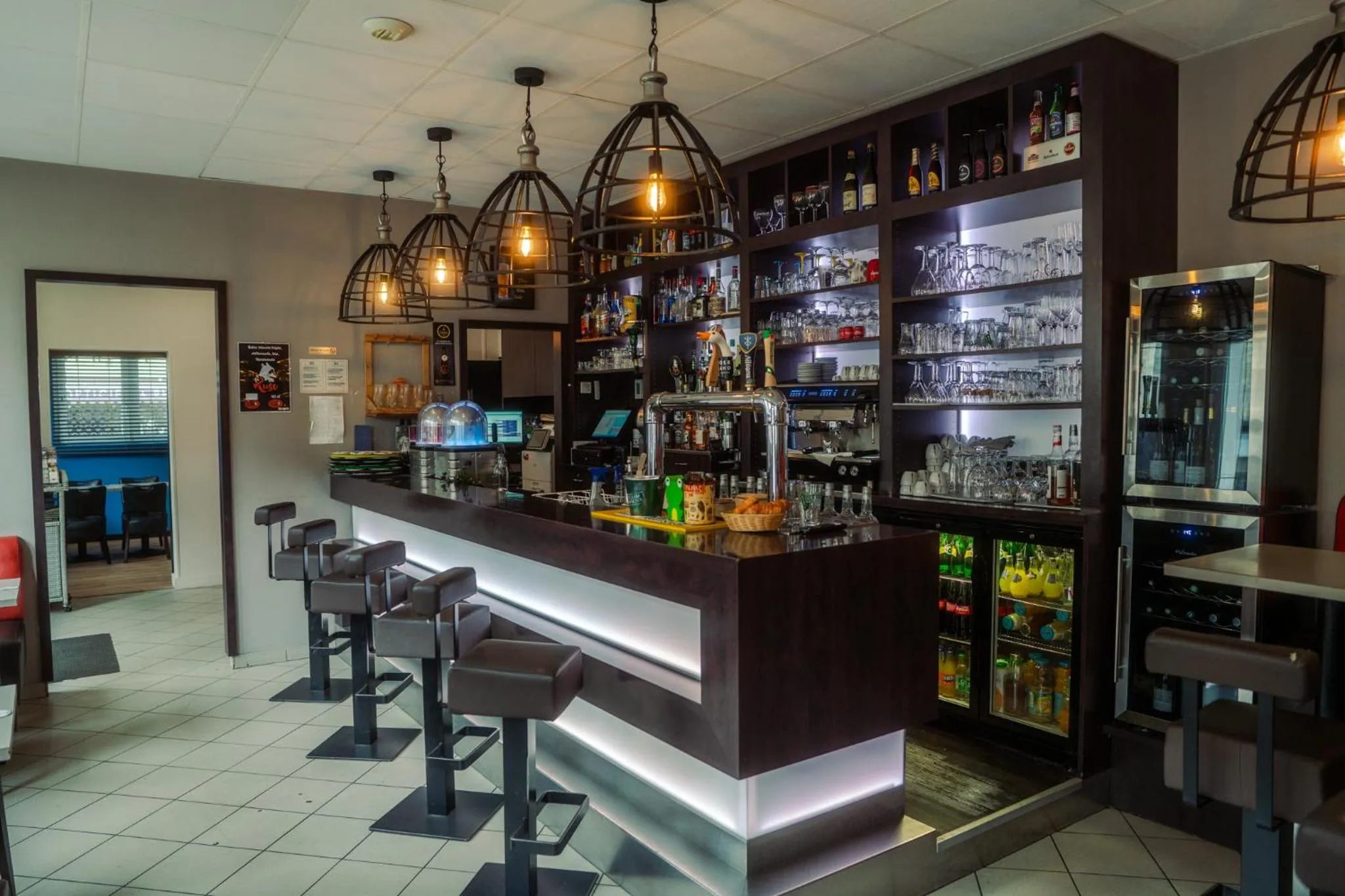 Lounge or bar in LOGIS -Hotel & Restaurant de la Place