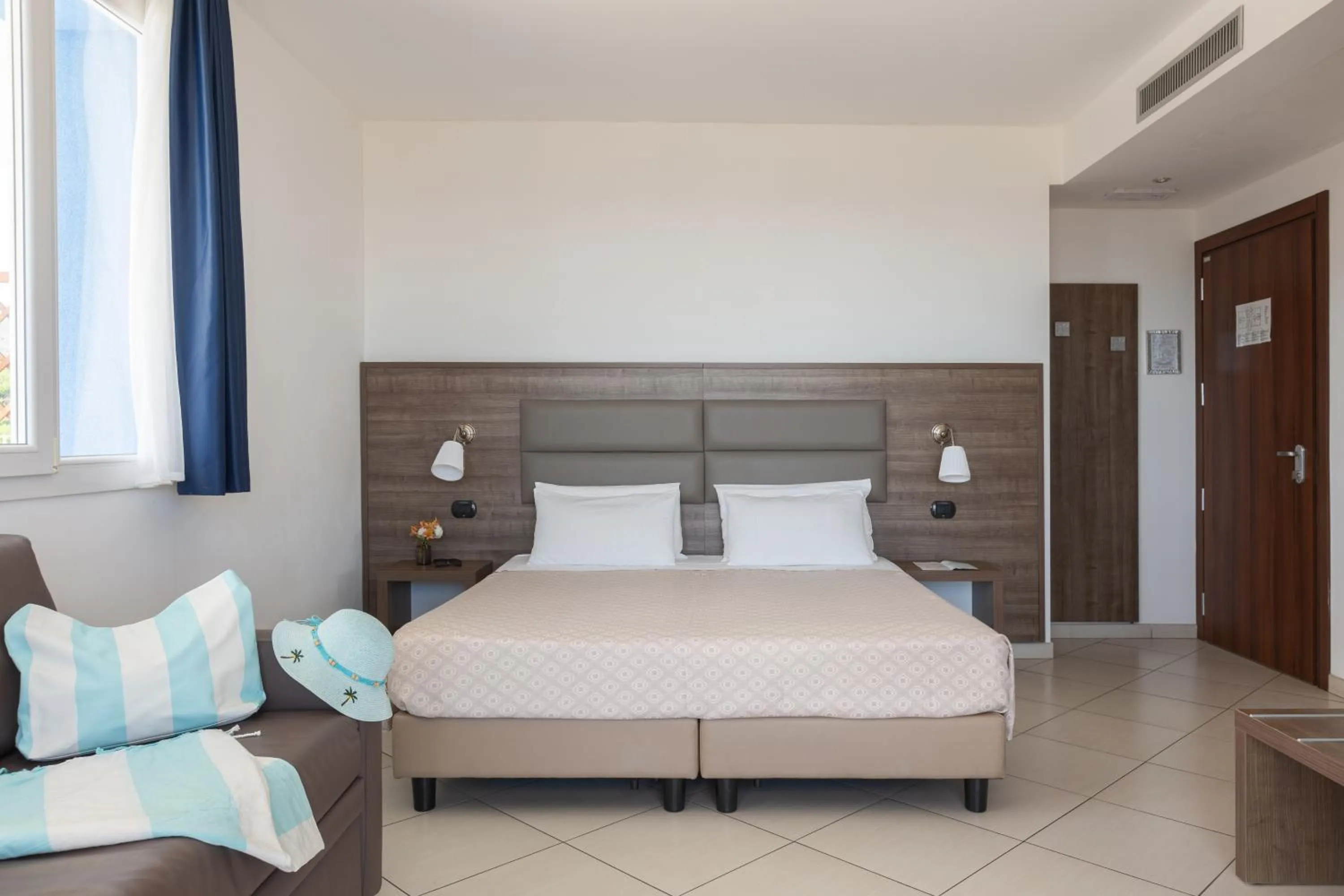 Bed in Ai Pozzi Village Resort & SPA