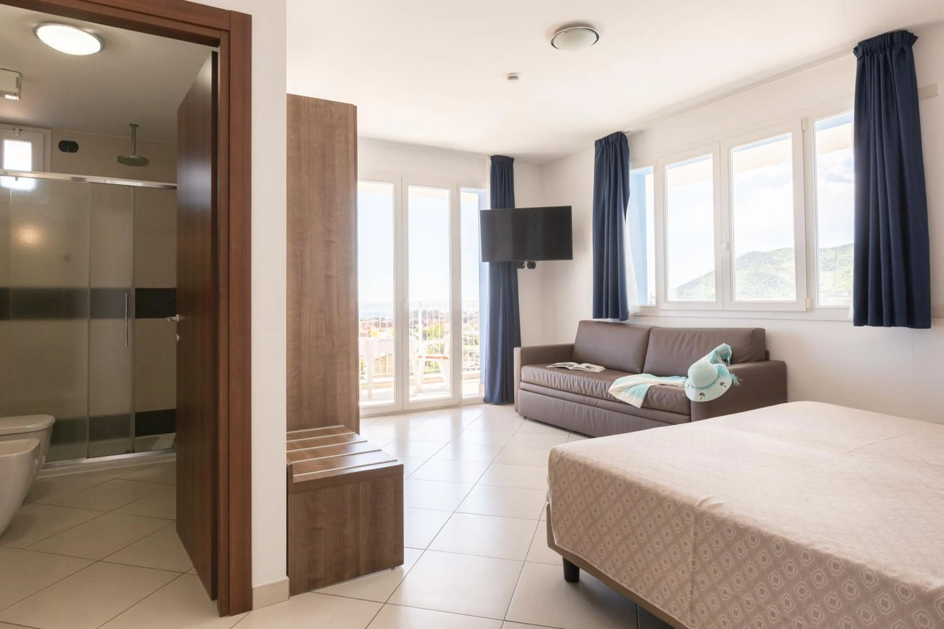 Bed in Ai Pozzi Village Resort & SPA