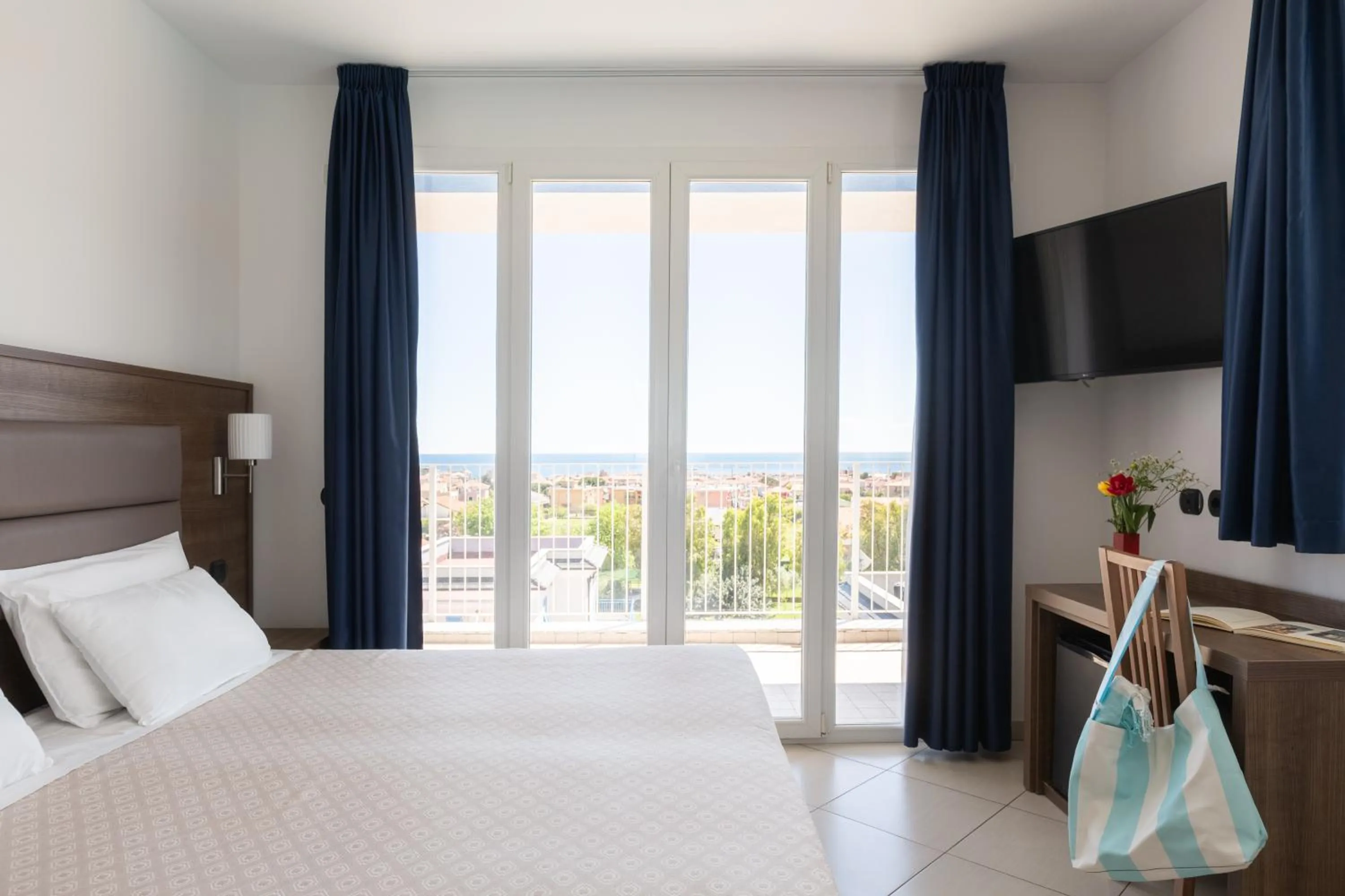 Bed in Ai Pozzi Village Resort & SPA