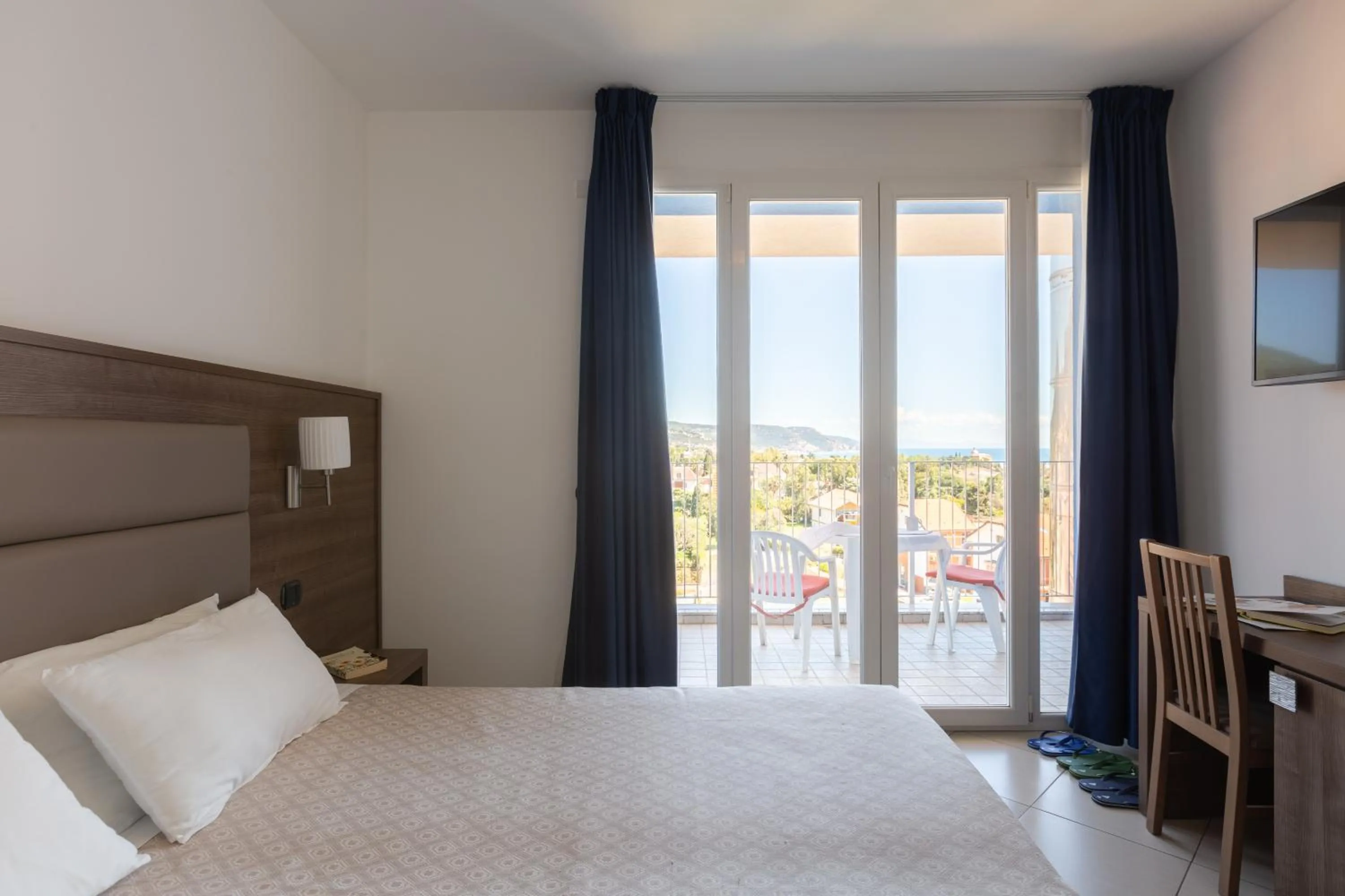 Bed in Ai Pozzi Village Resort & SPA