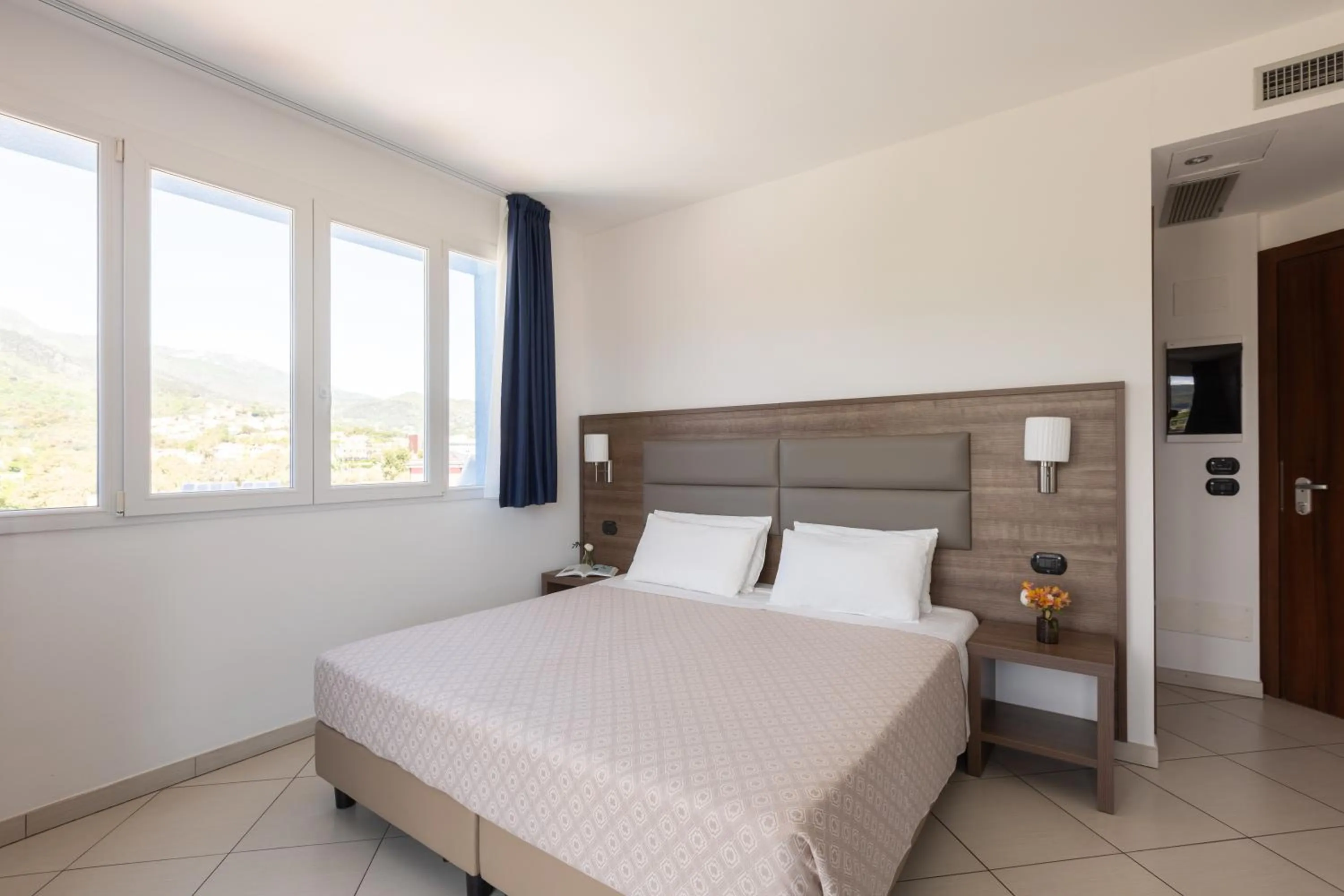 Bed in Ai Pozzi Village Resort & SPA