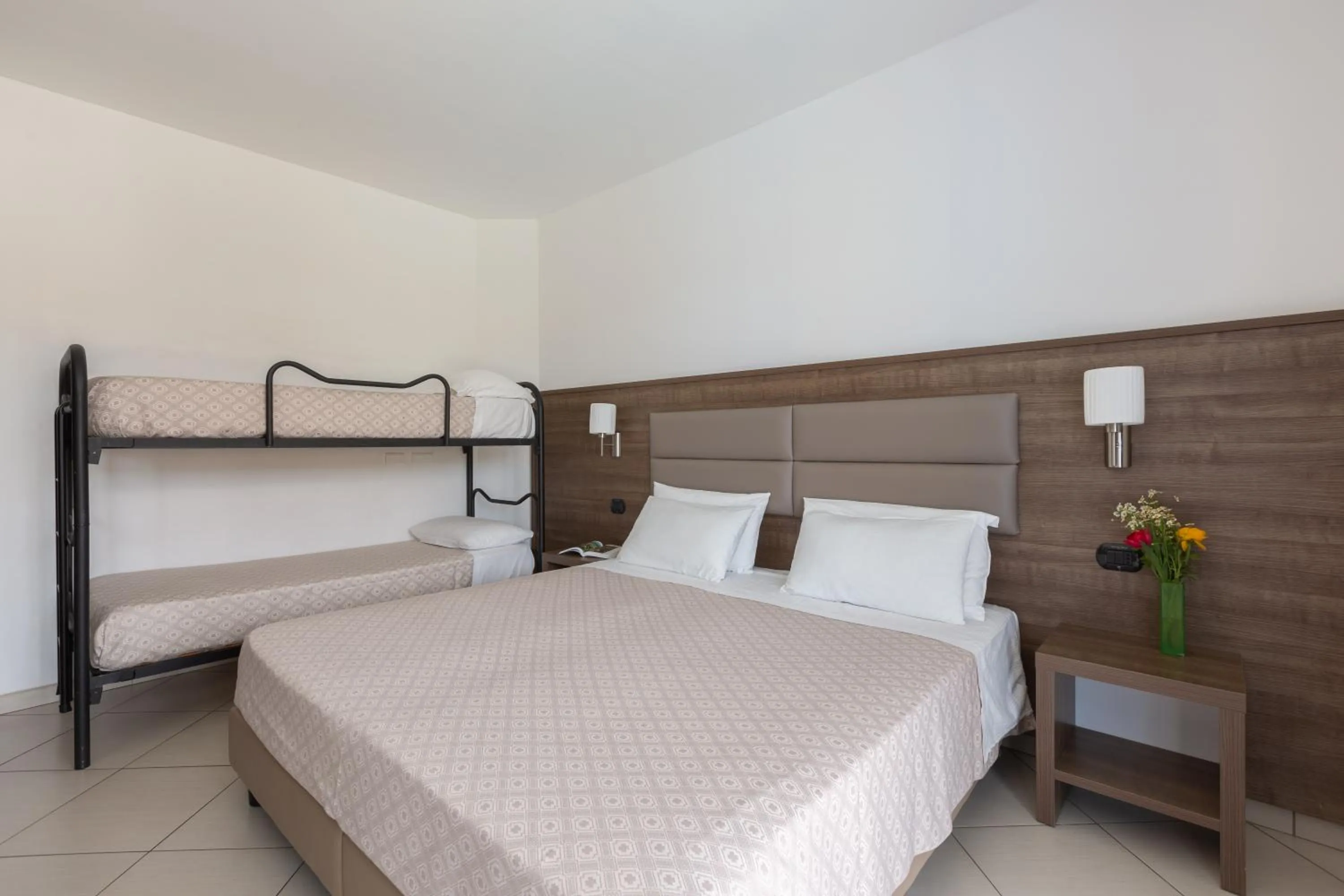 Bed in Ai Pozzi Village Resort & SPA