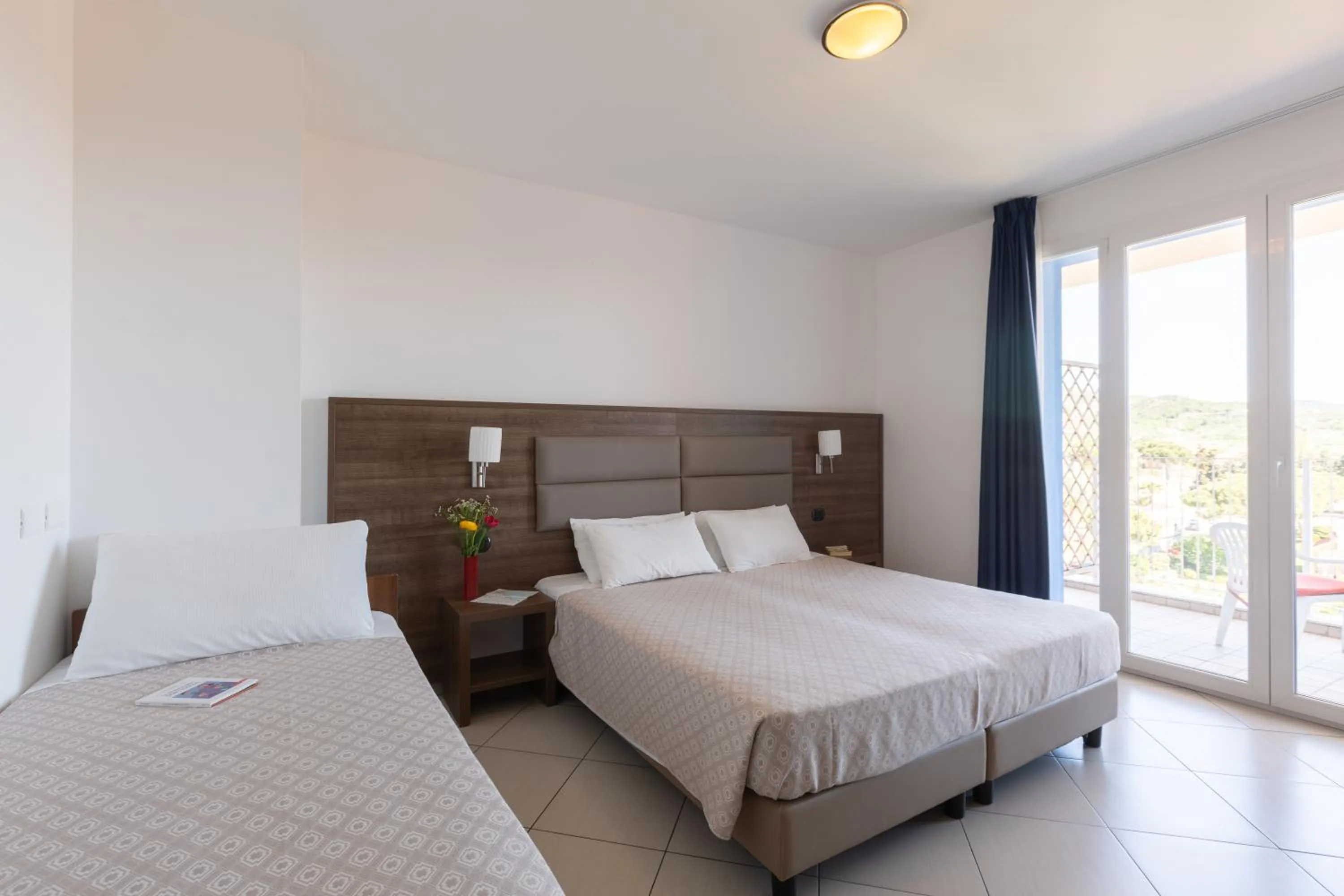 Bed in Ai Pozzi Village Resort & SPA