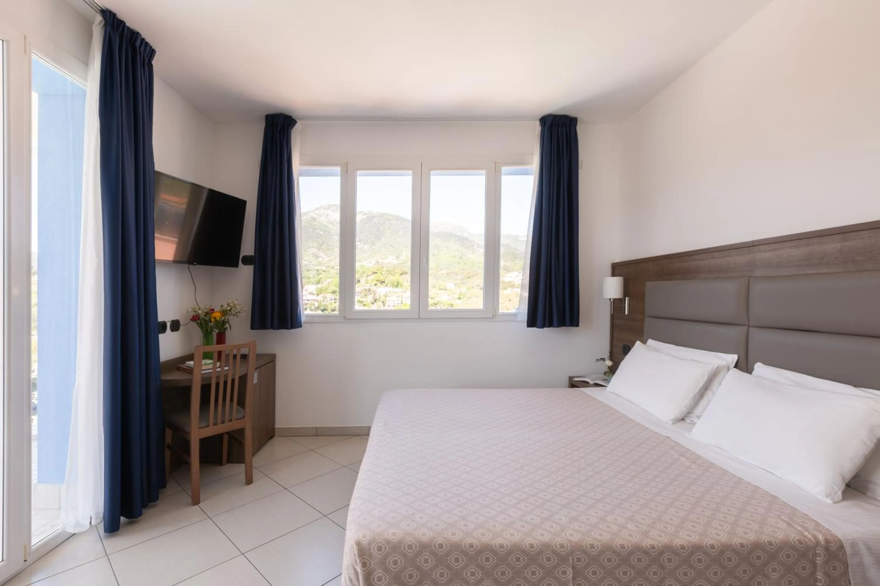 Bed in Ai Pozzi Village Resort & SPA