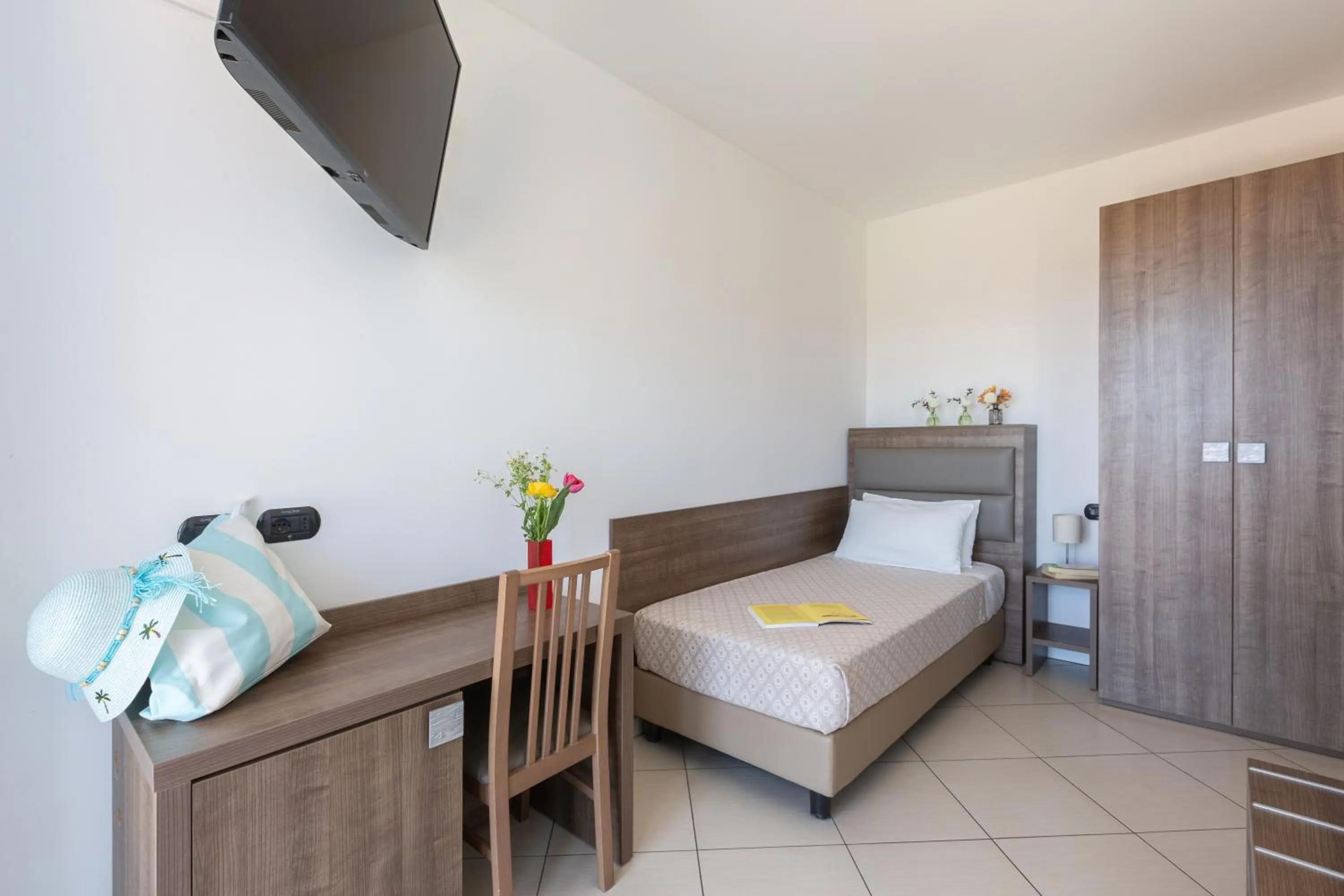 Bed in Ai Pozzi Village Resort & SPA