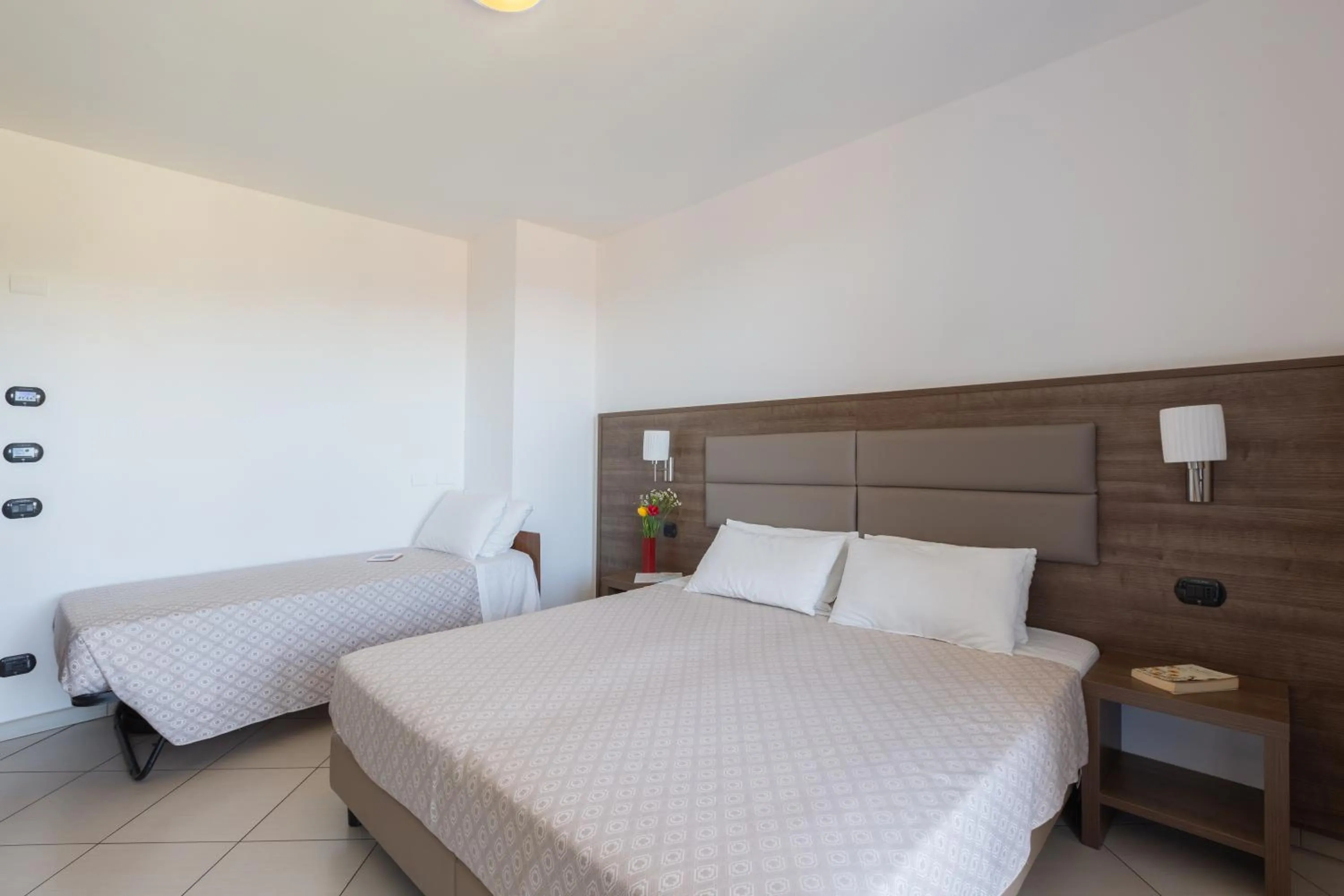 Bed in Ai Pozzi Village Resort & SPA