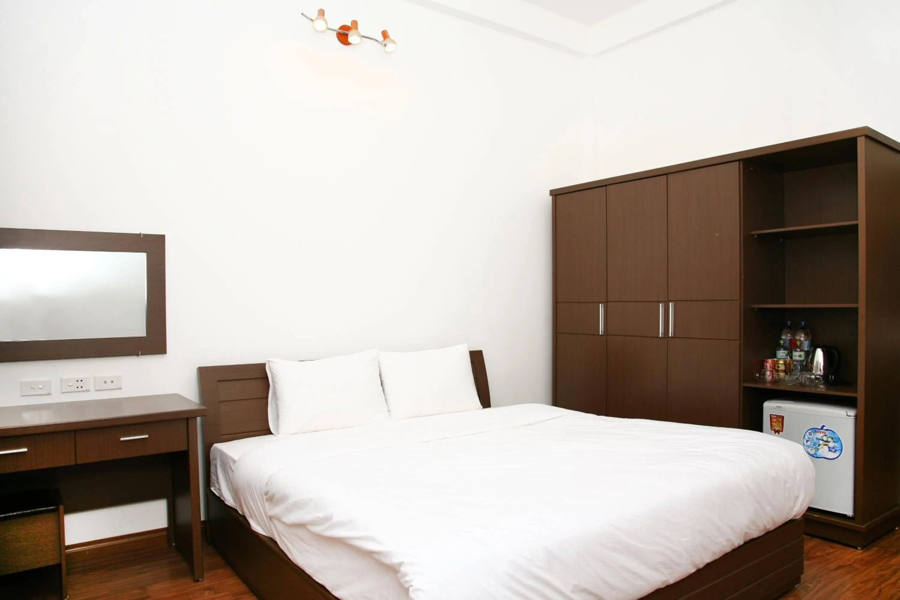 Bed in Bluebell Hotel