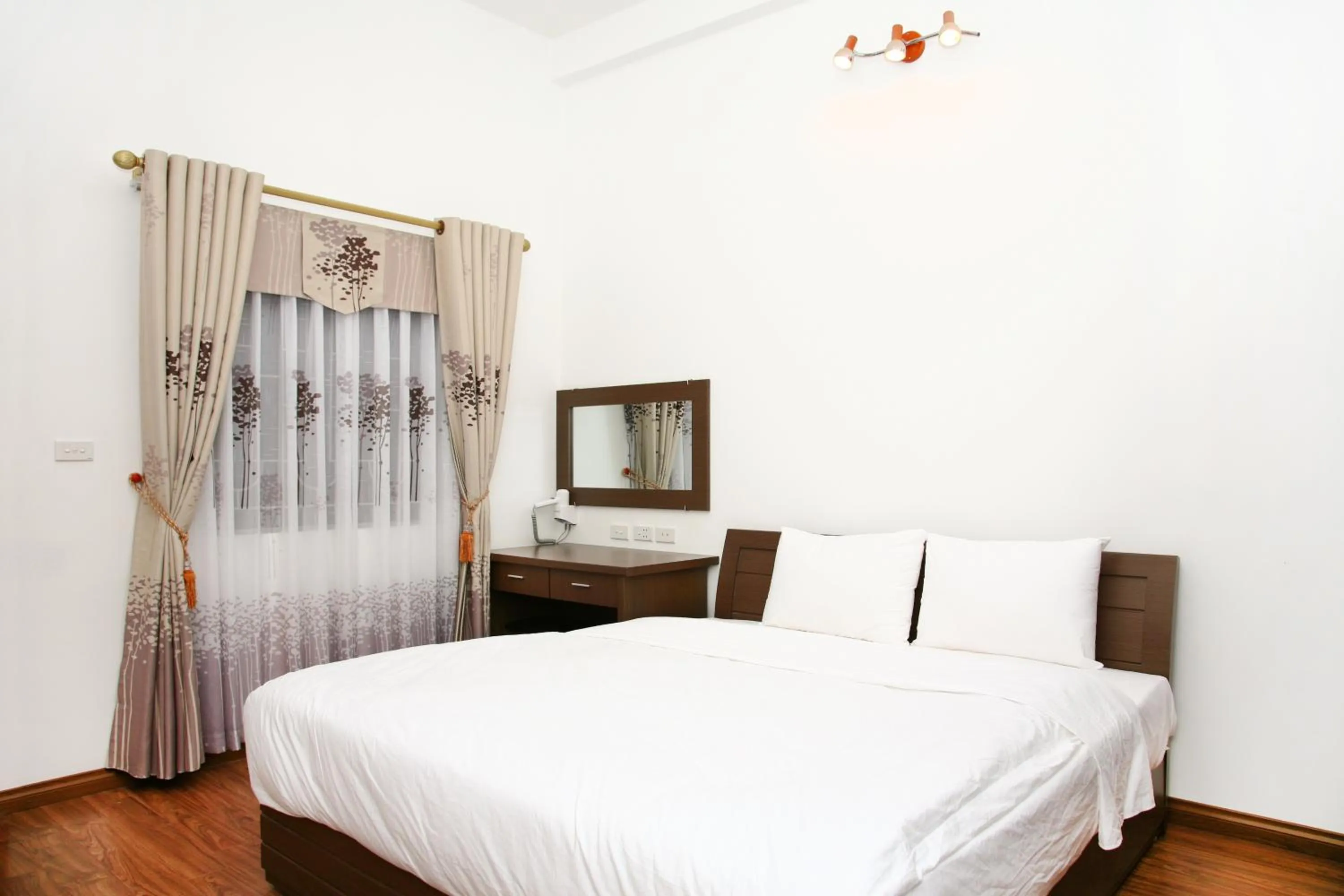 Bed in Bluebell Hotel