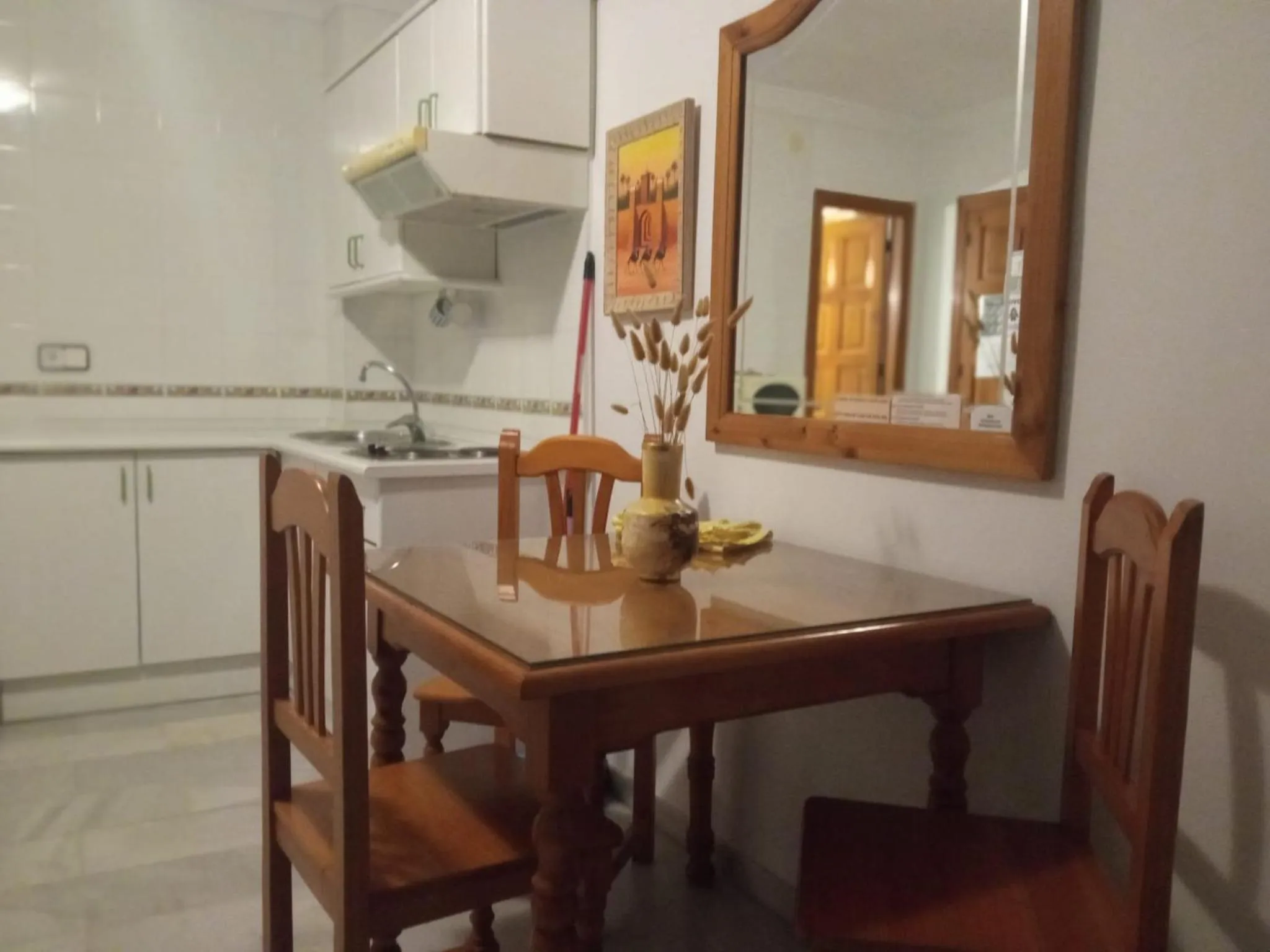 Kitchen or kitchenette in Apartamentos Pepe Mesa