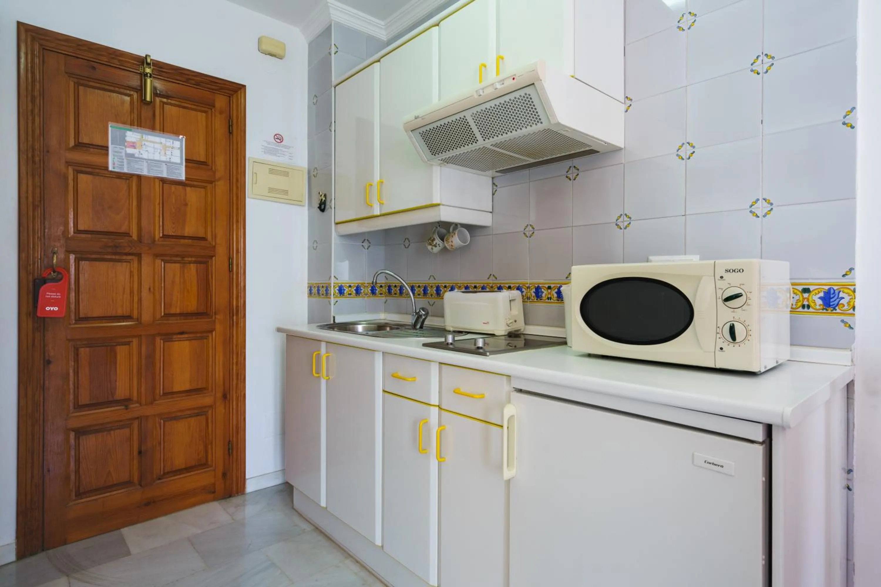 Kitchen or kitchenette in Apartamentos Pepe Mesa