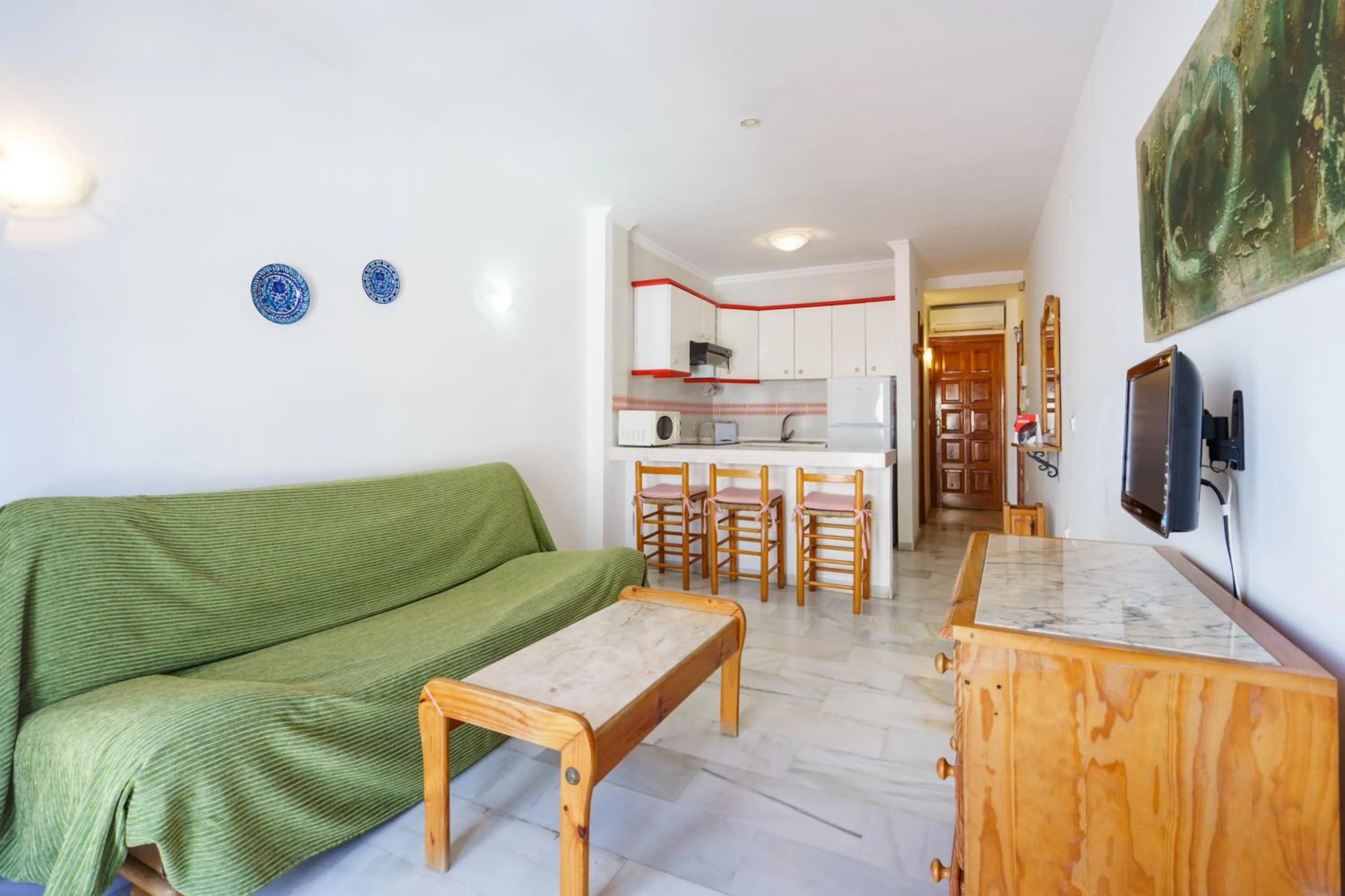 Kitchen or kitchenette in Apartamentos Pepe Mesa