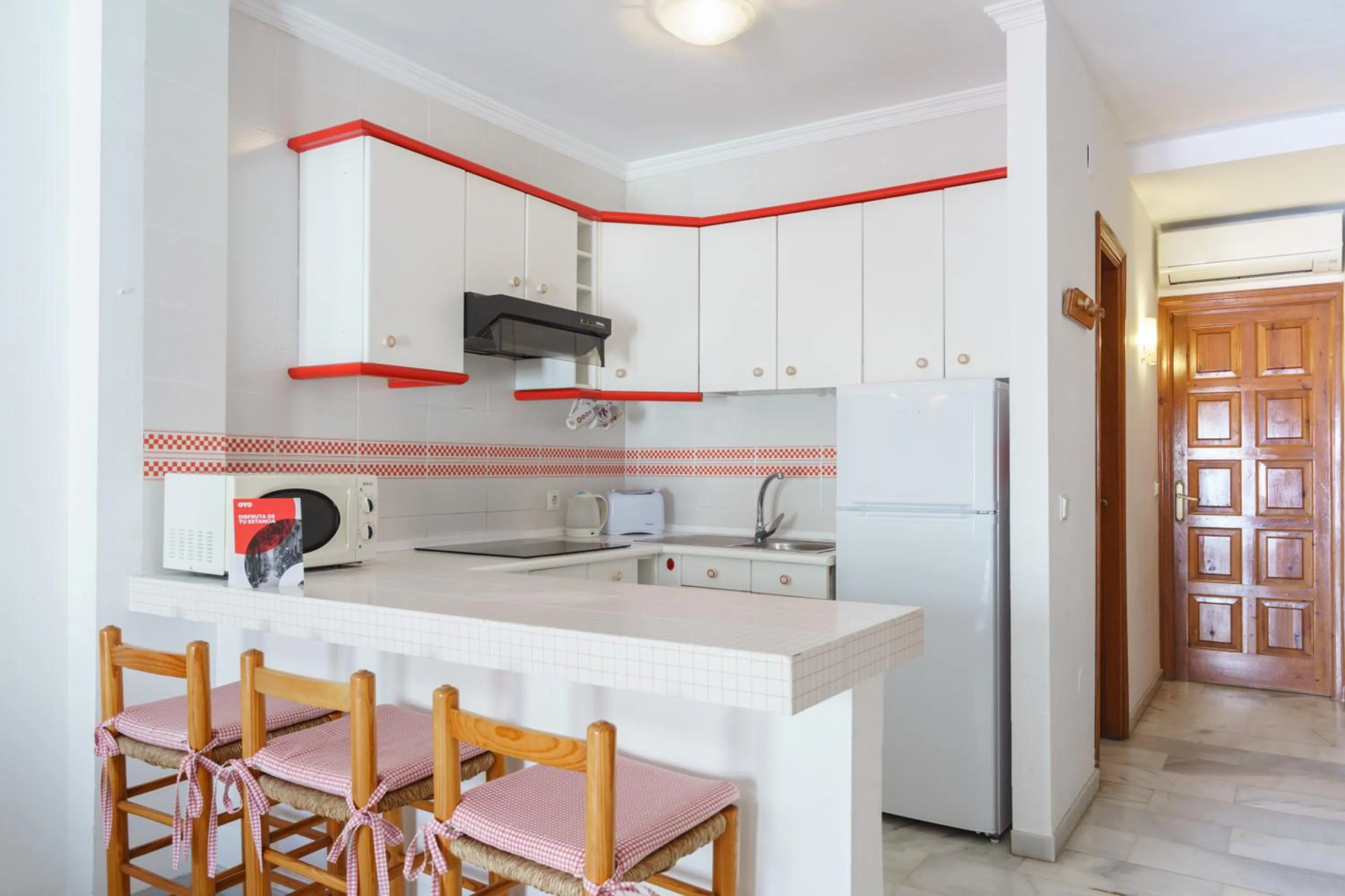 Kitchen or kitchenette in Apartamentos Pepe Mesa