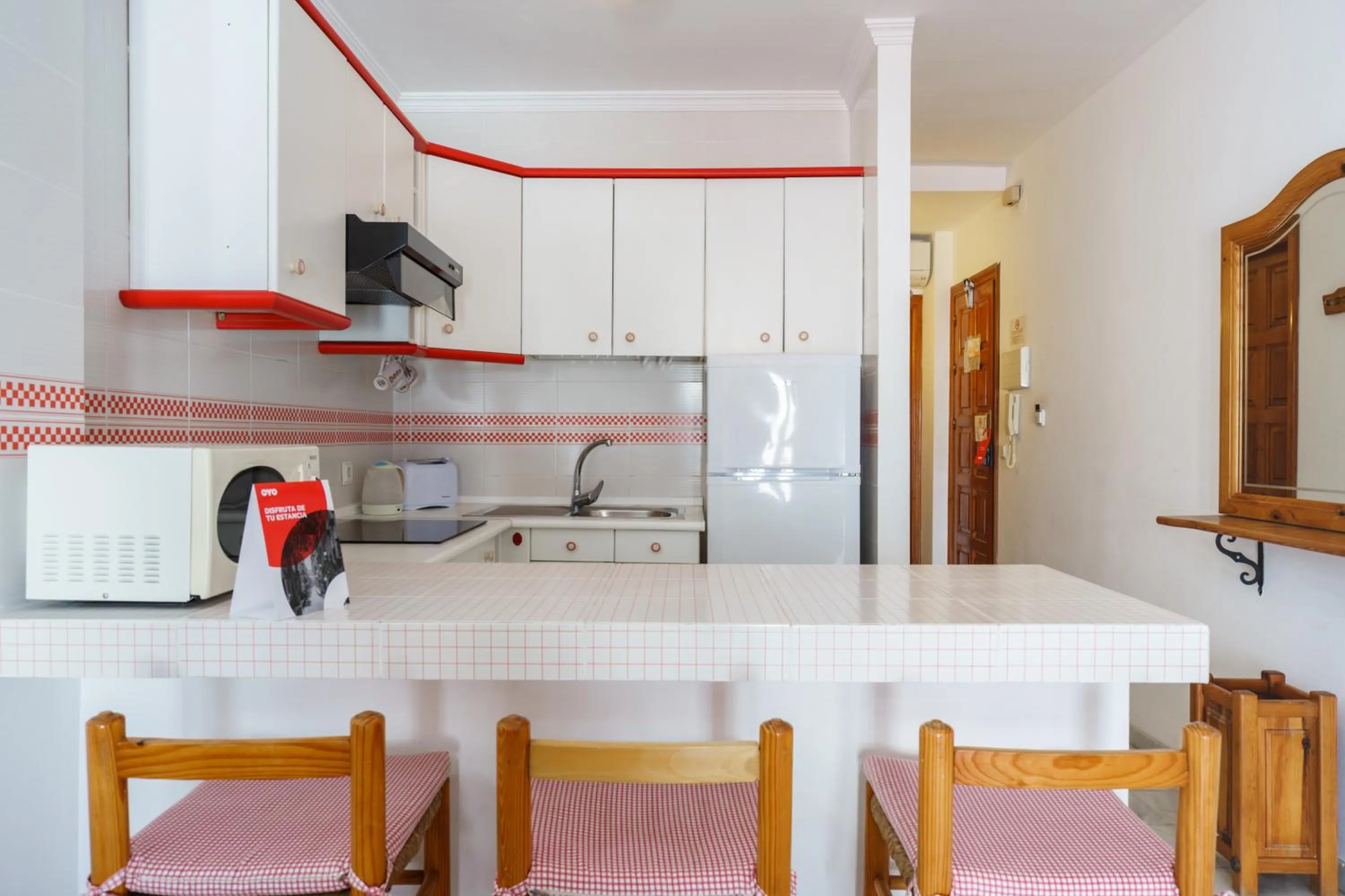 Kitchen or kitchenette in Apartamentos Pepe Mesa