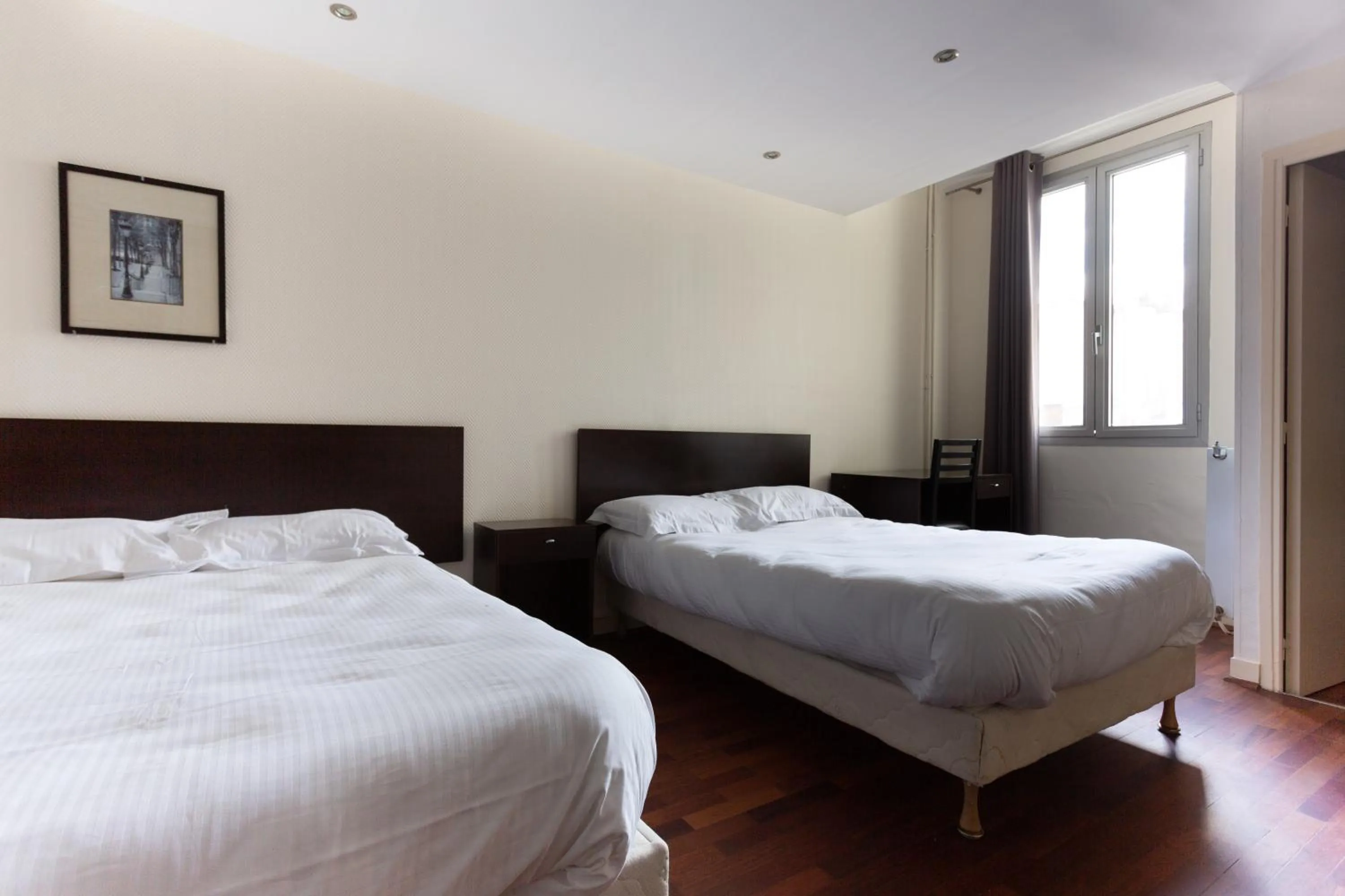 Photo of the whole room, Bed in Hotel Mimosa Paris