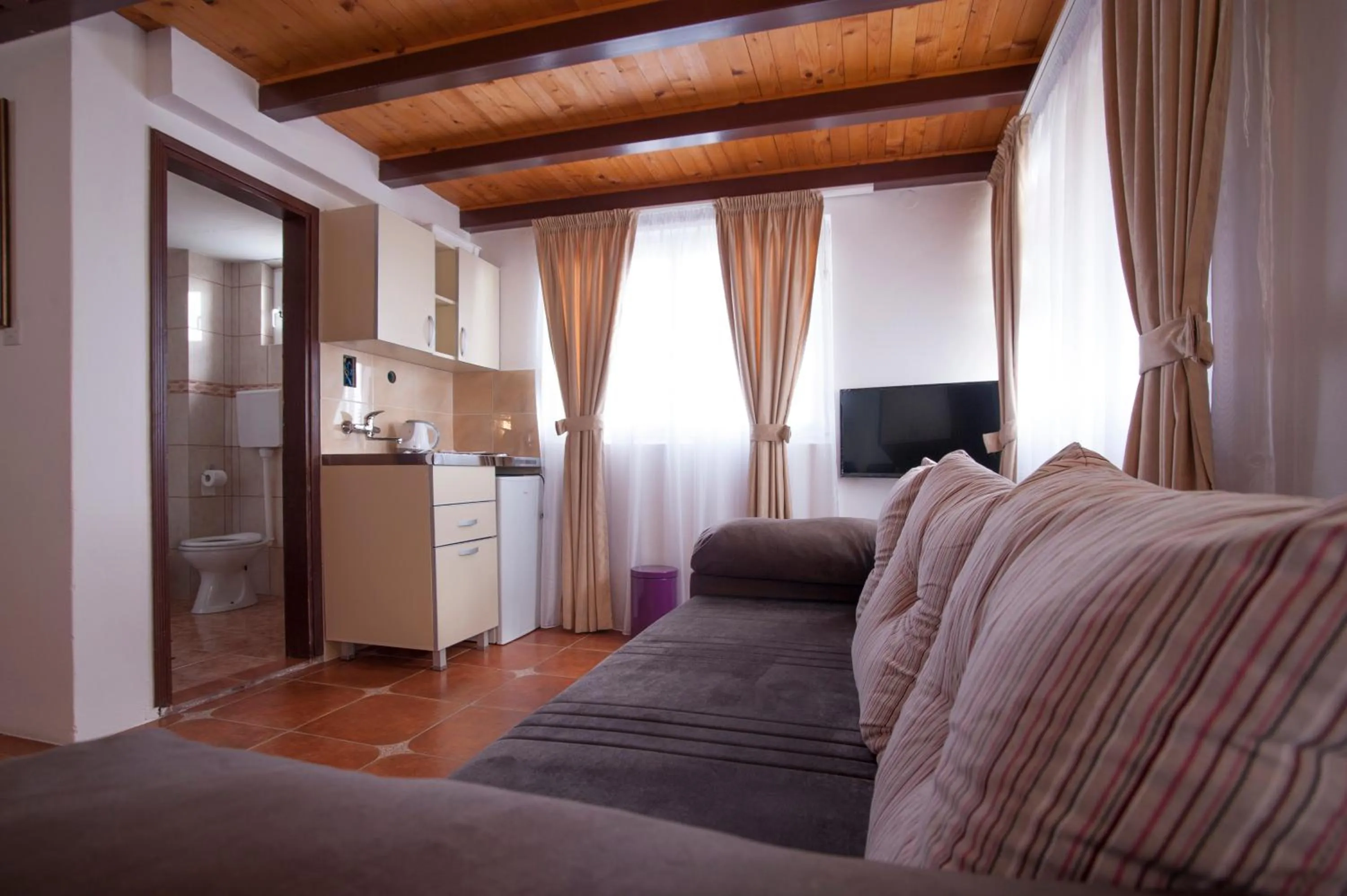 Kitchen or kitchenette in Apartments Grand