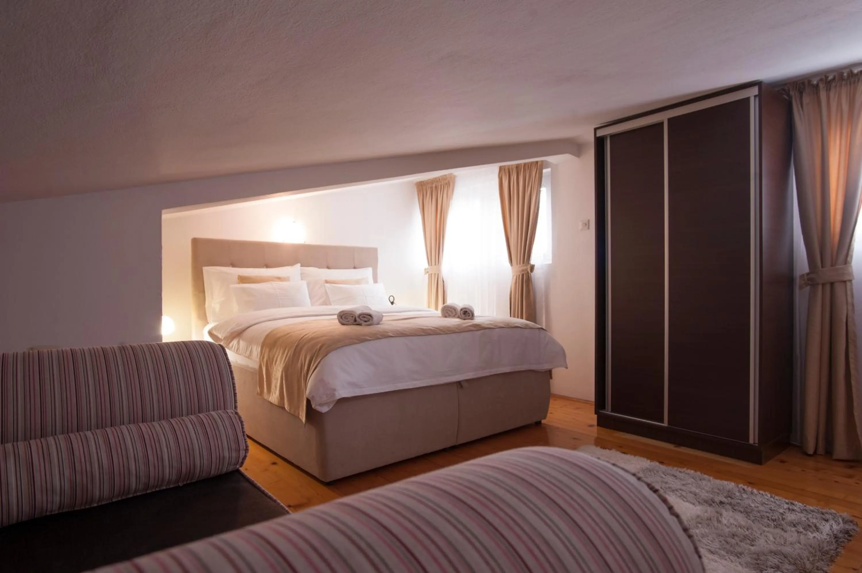 Bed in Apartments Grand