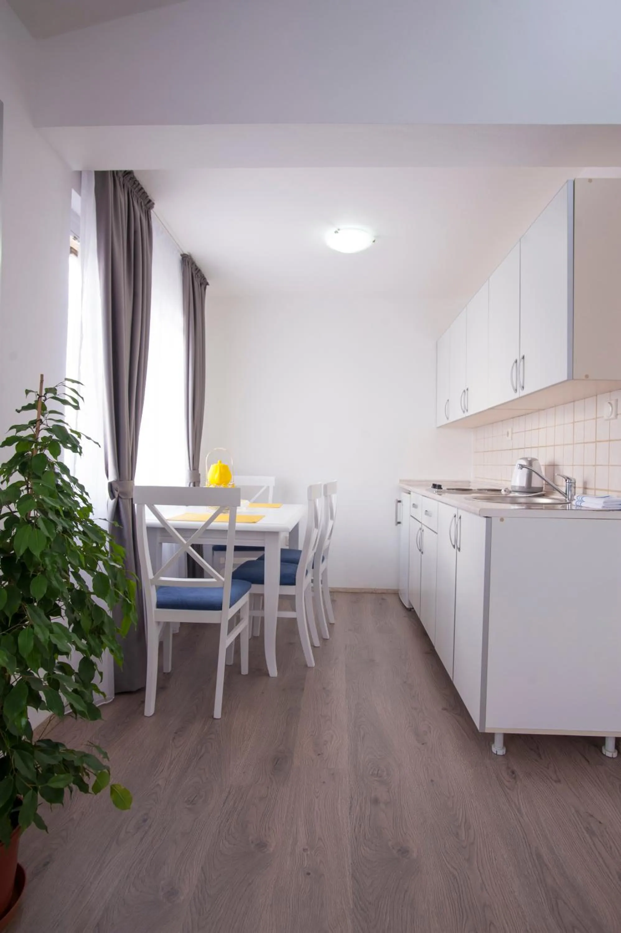 Kitchen or kitchenette in Apartments Grand