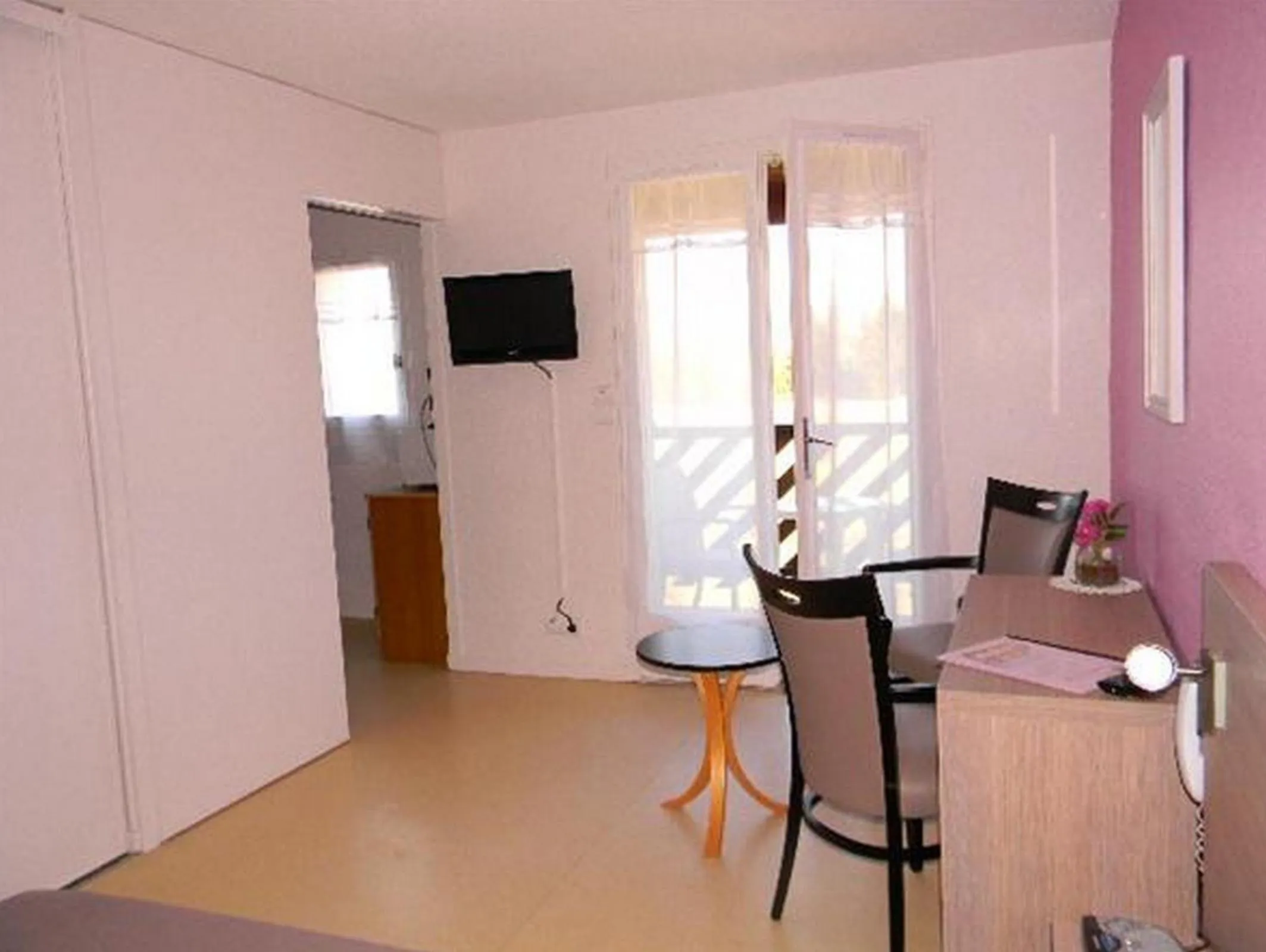 Bedroom in Résidence Hôtelière Hélios