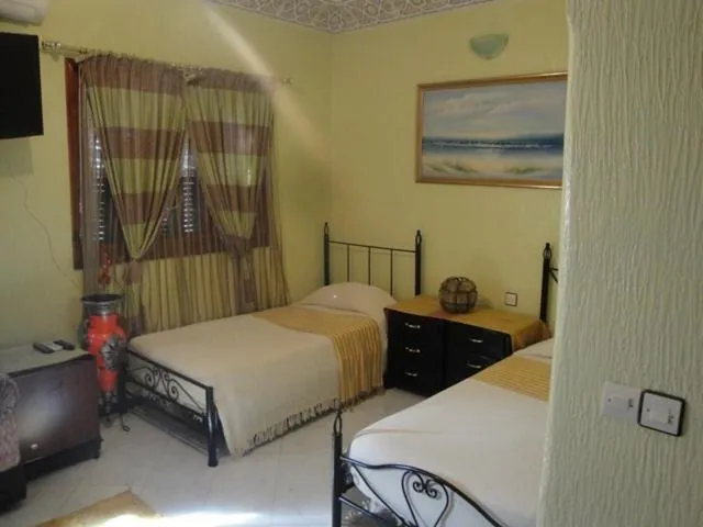 Bedroom in Hôtel Tijani