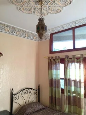 Bedroom in Hôtel Tijani