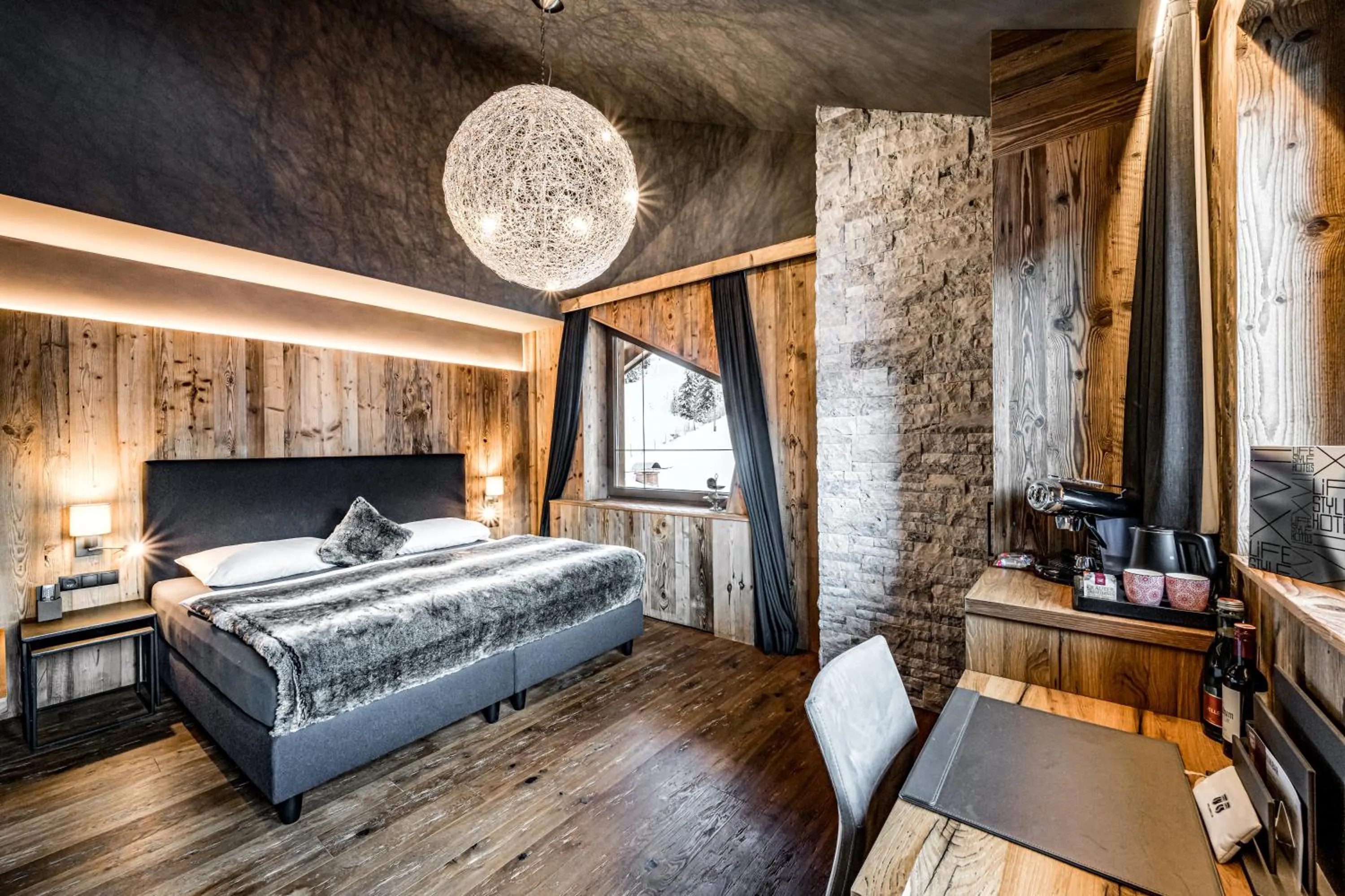 Photo of the whole room, Bed in ALMMONTE SENSUM SUITES - Funky Living Hotel