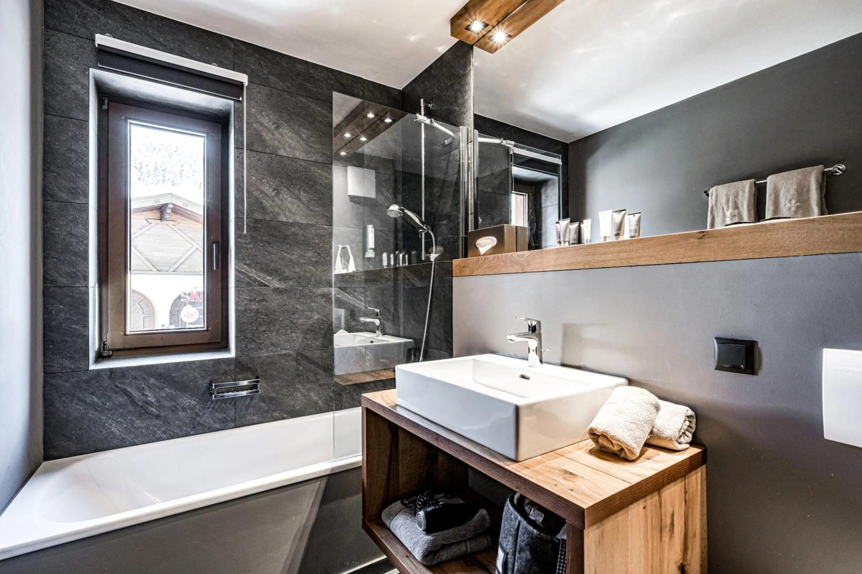 Bathroom in ALMMONTE SENSUM SUITES - Funky Living Hotel