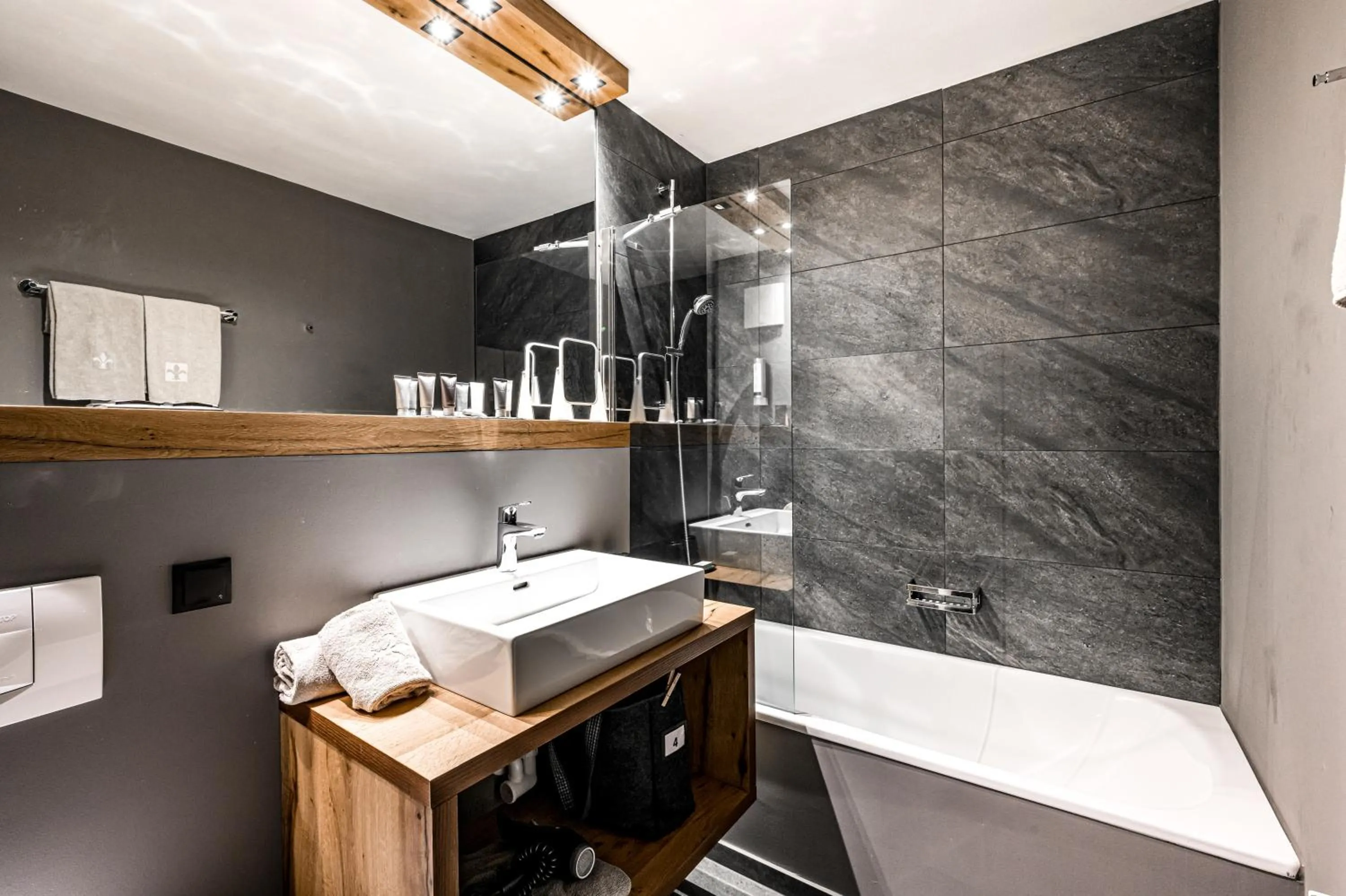 Bathroom in ALMMONTE SENSUM SUITES - Funky Living Hotel