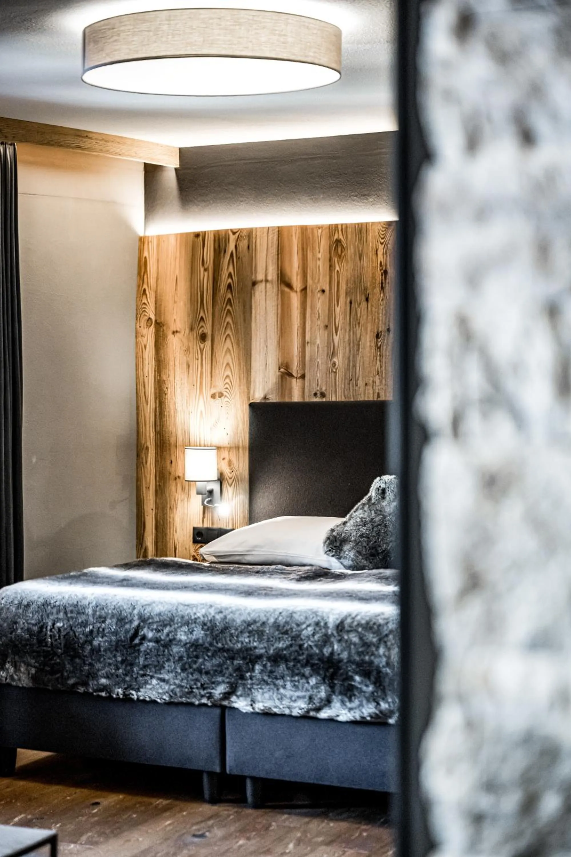 Bed in ALMMONTE SENSUM SUITES - Funky Living Hotel