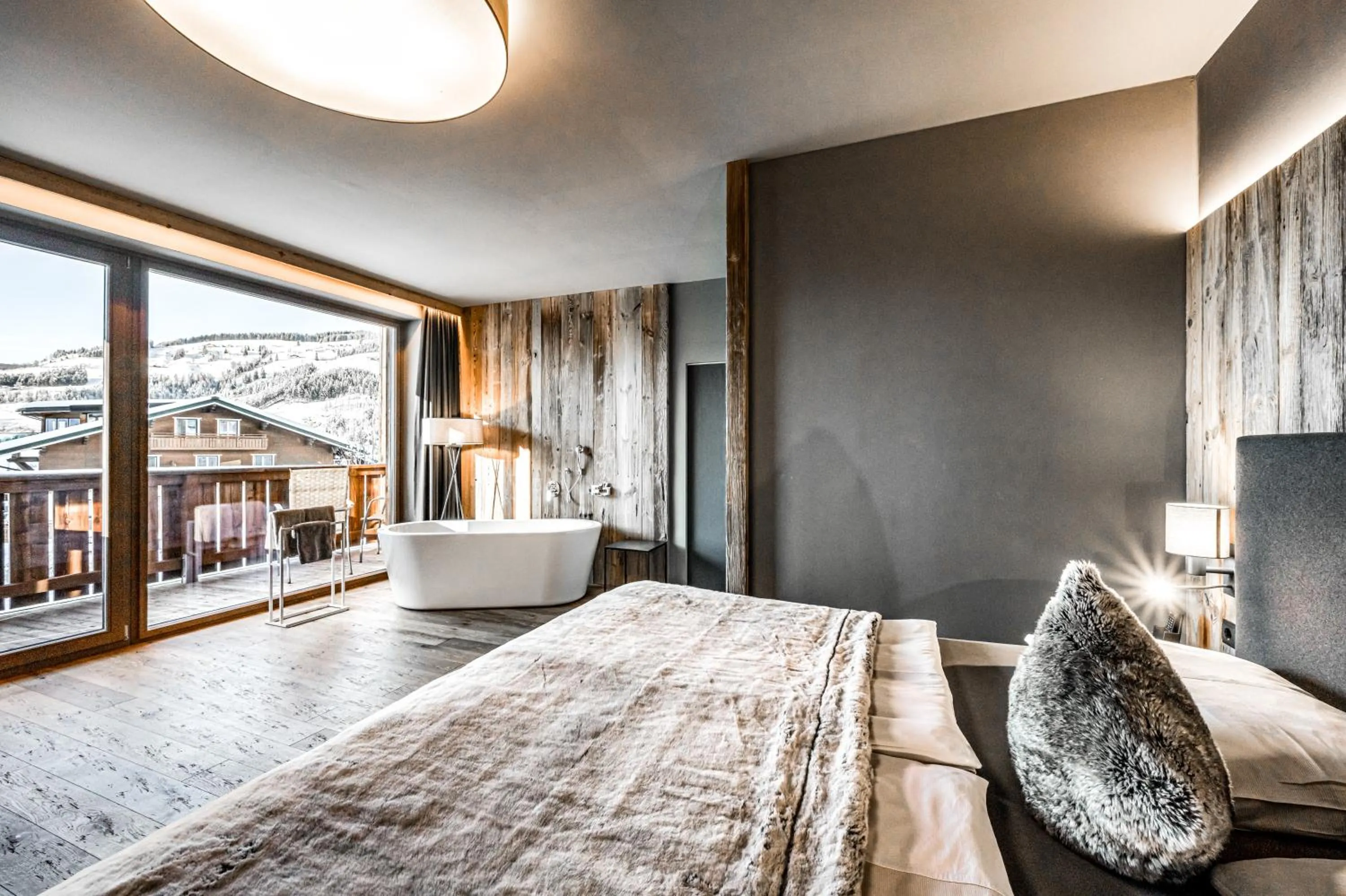 Photo of the whole room, Bed in ALMMONTE SENSUM SUITES - Funky Living Hotel