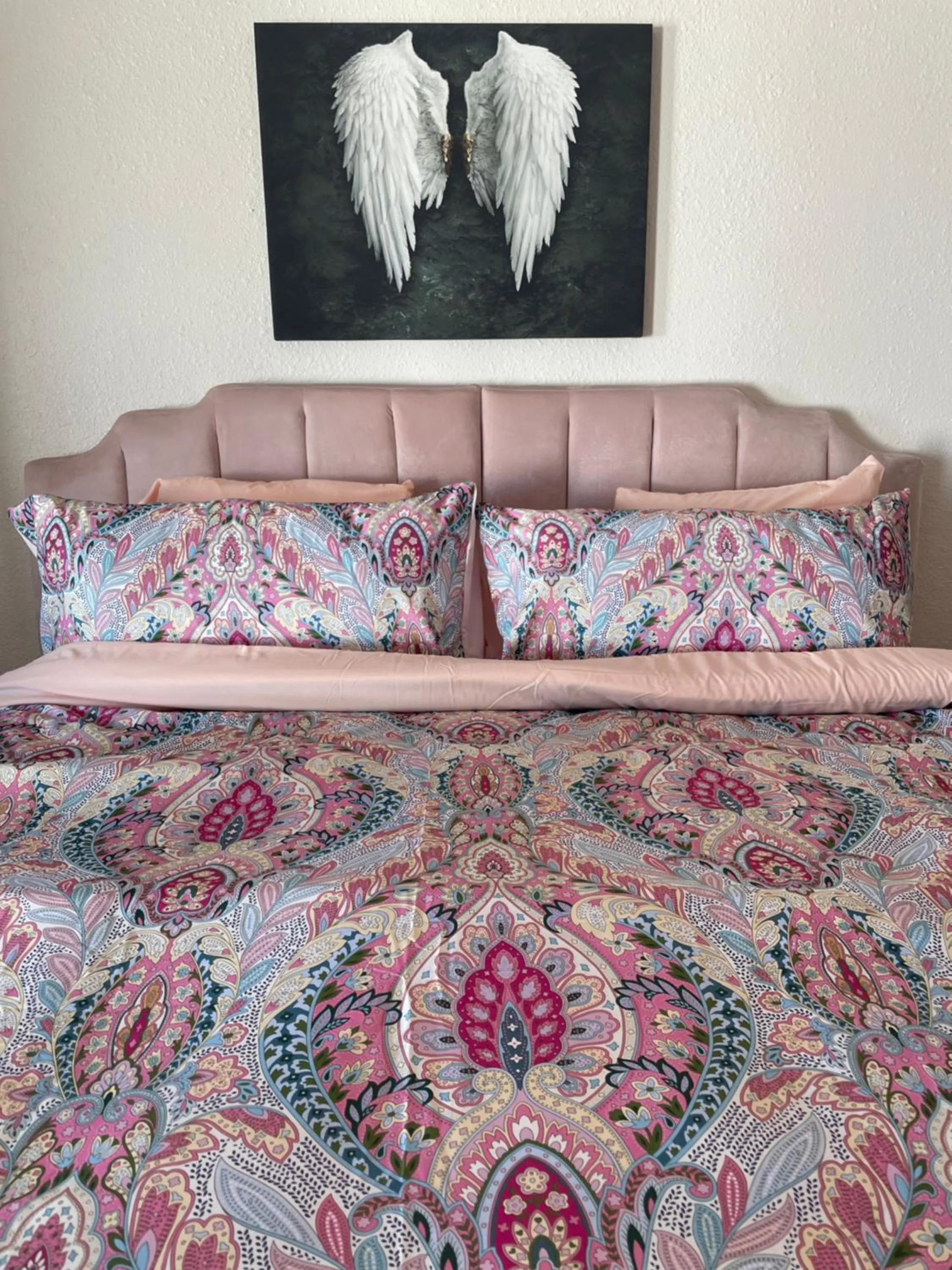 Bed in Rainbow Motel