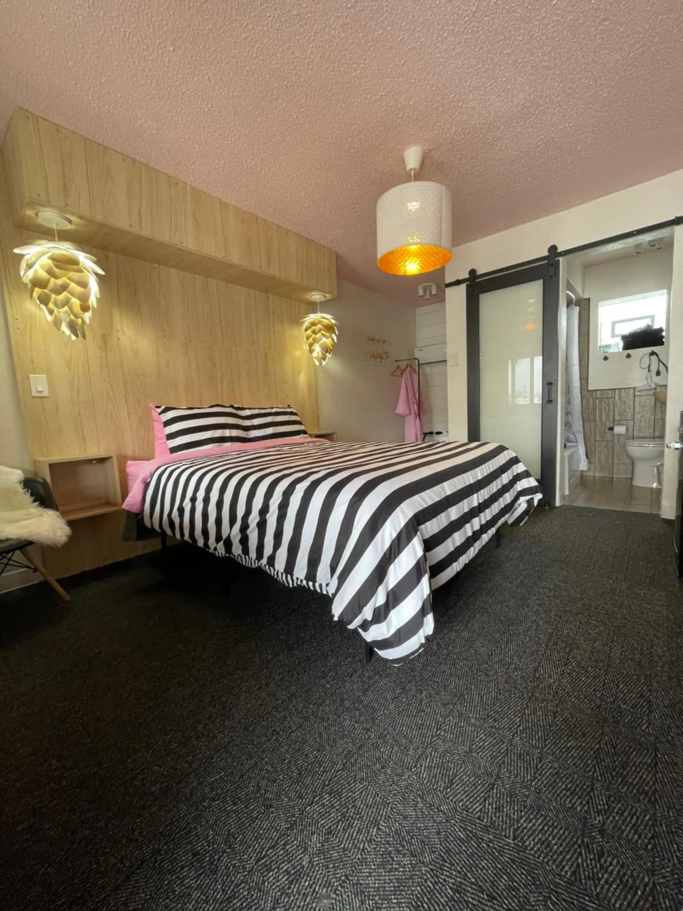 Bed in Rainbow Motel