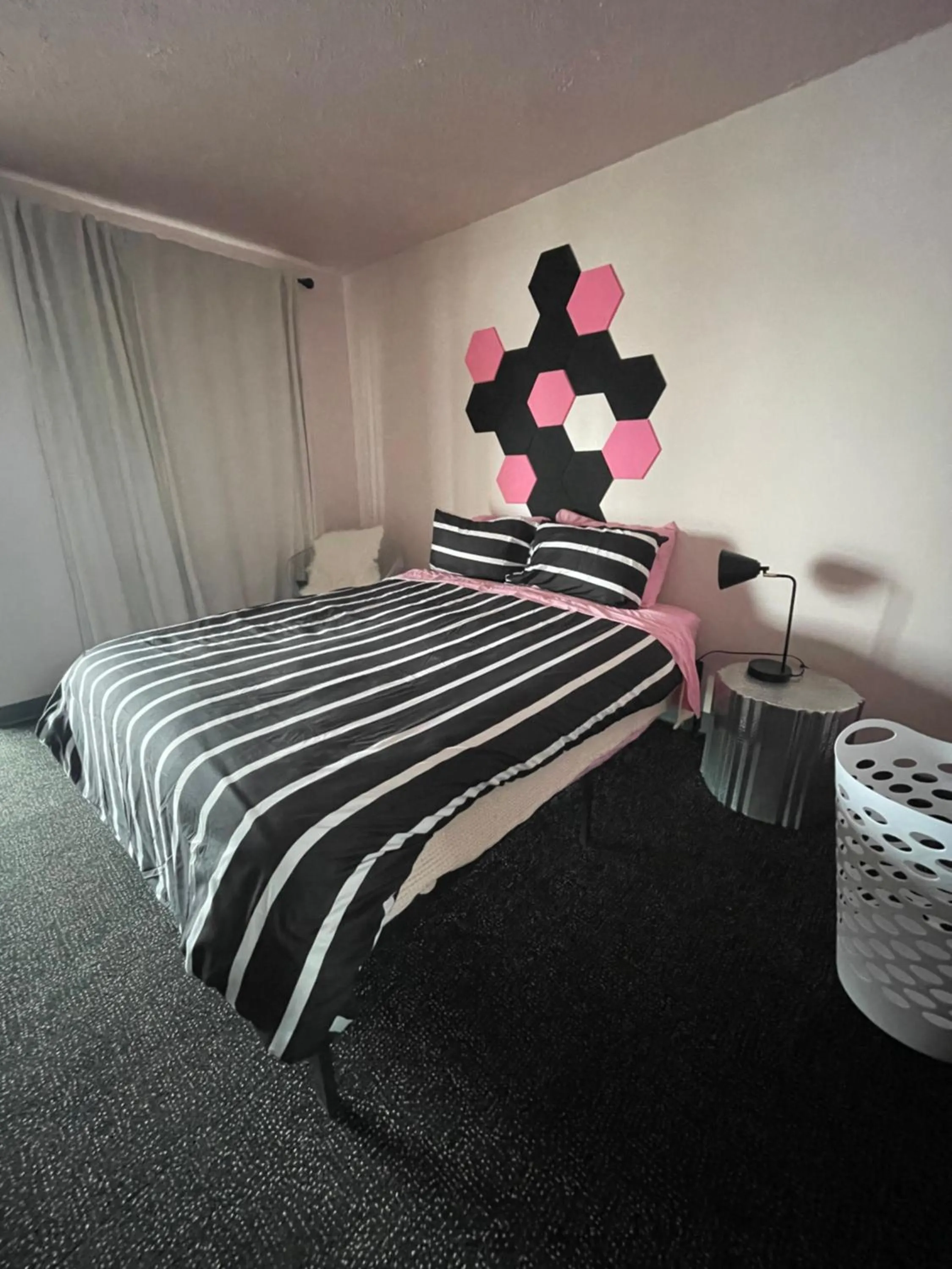 Bed in Rainbow Motel