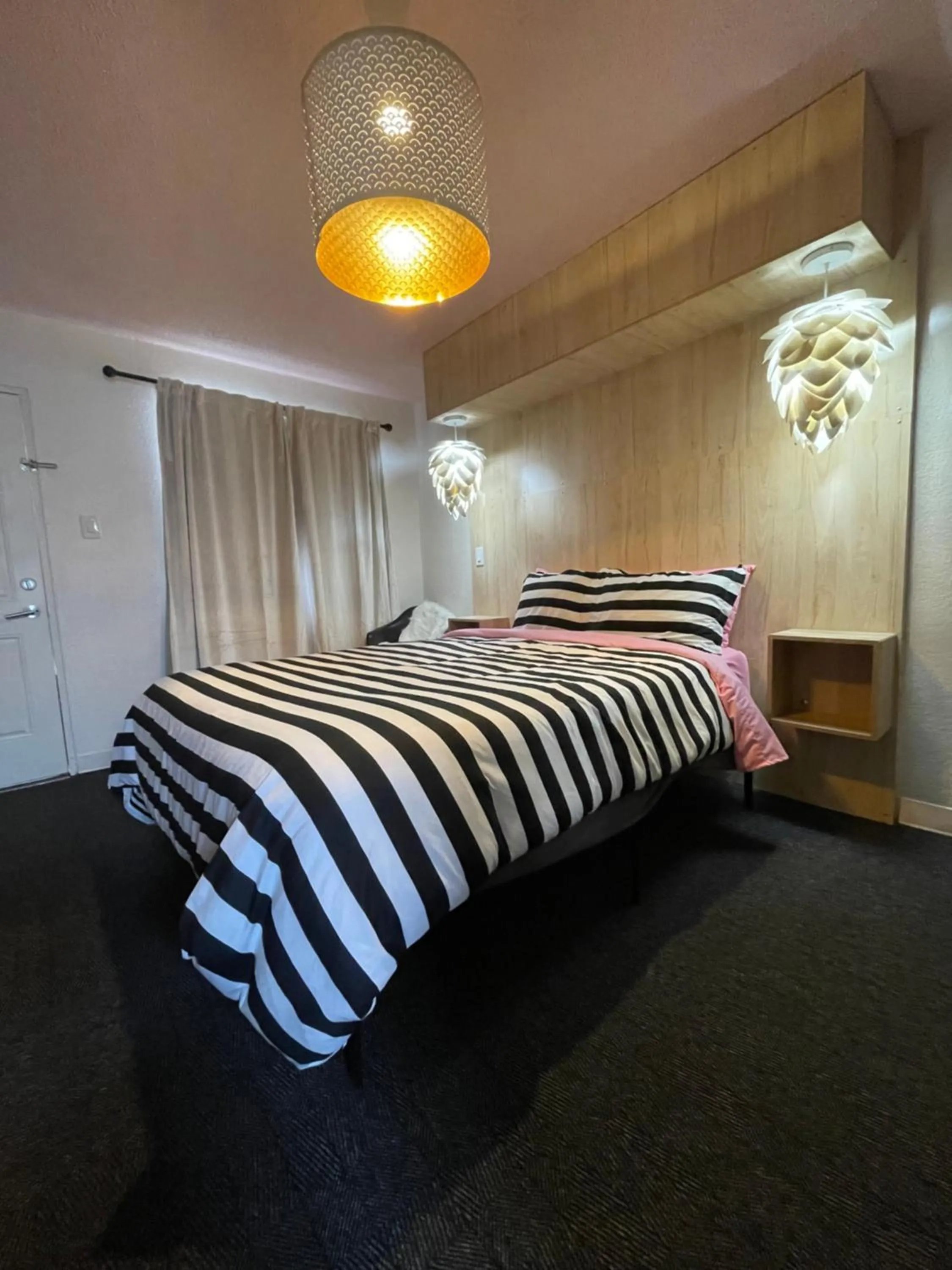 Bed in Rainbow Motel