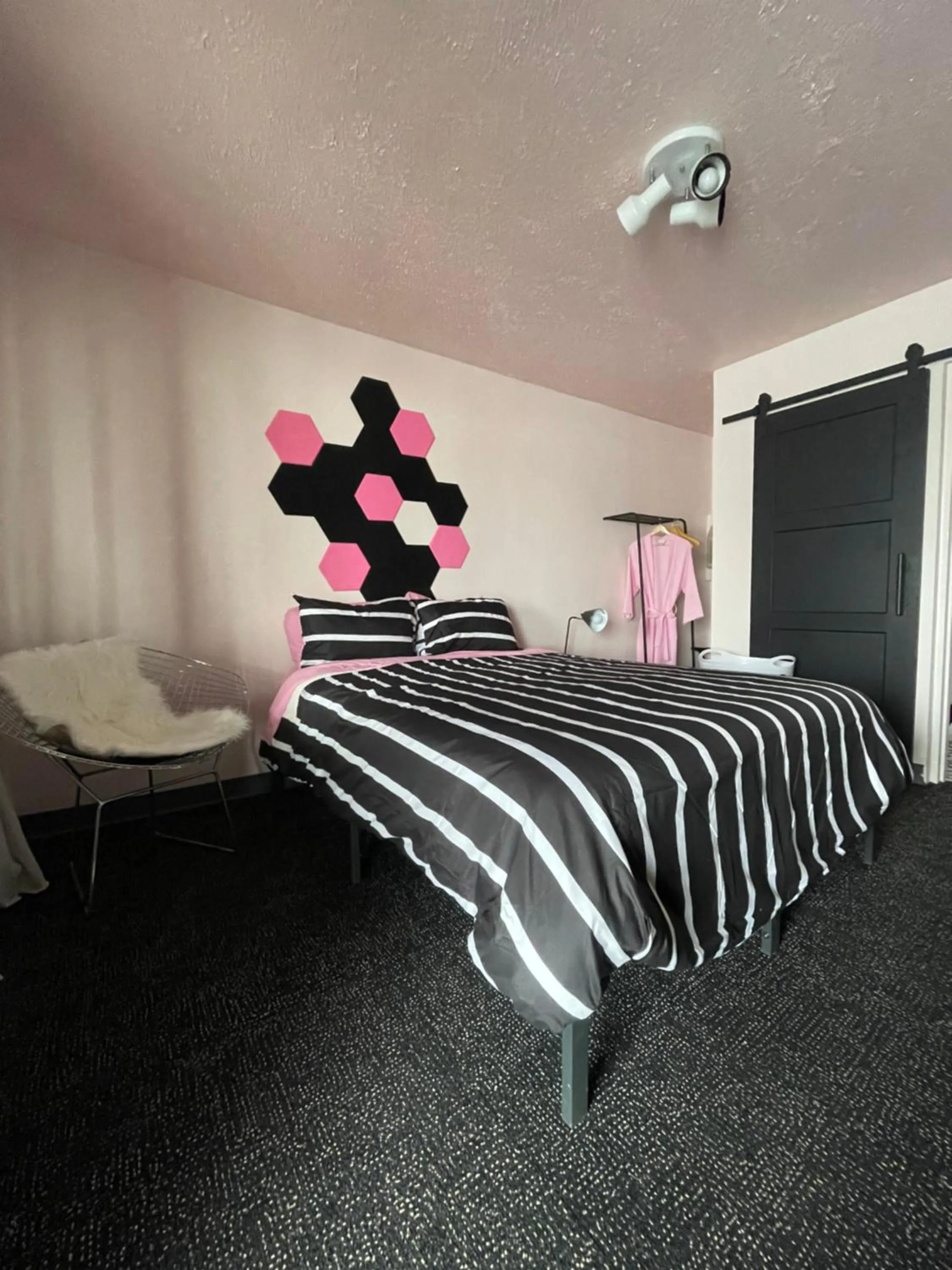 Bed in Rainbow Motel