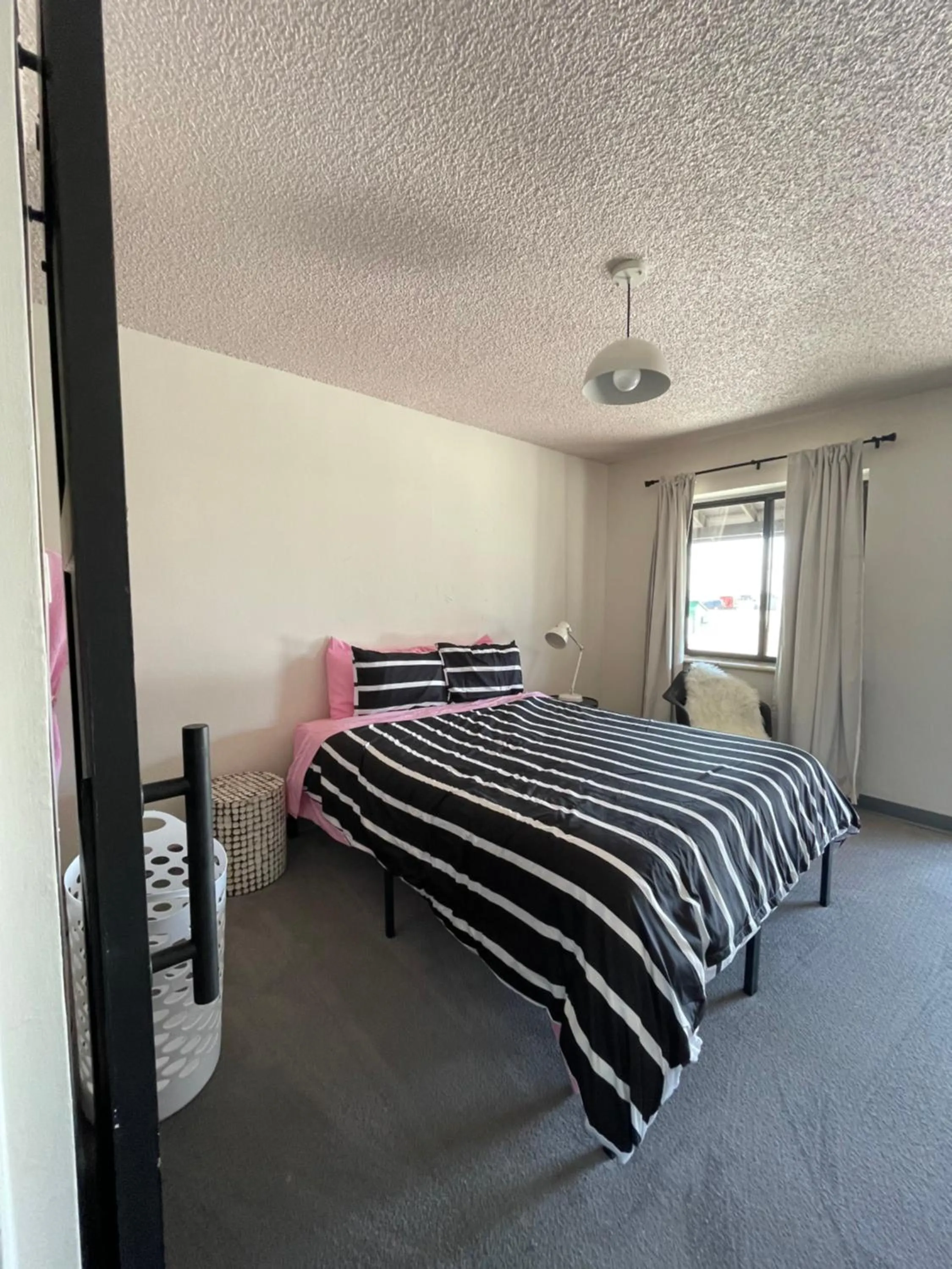 Bed in Rainbow Motel