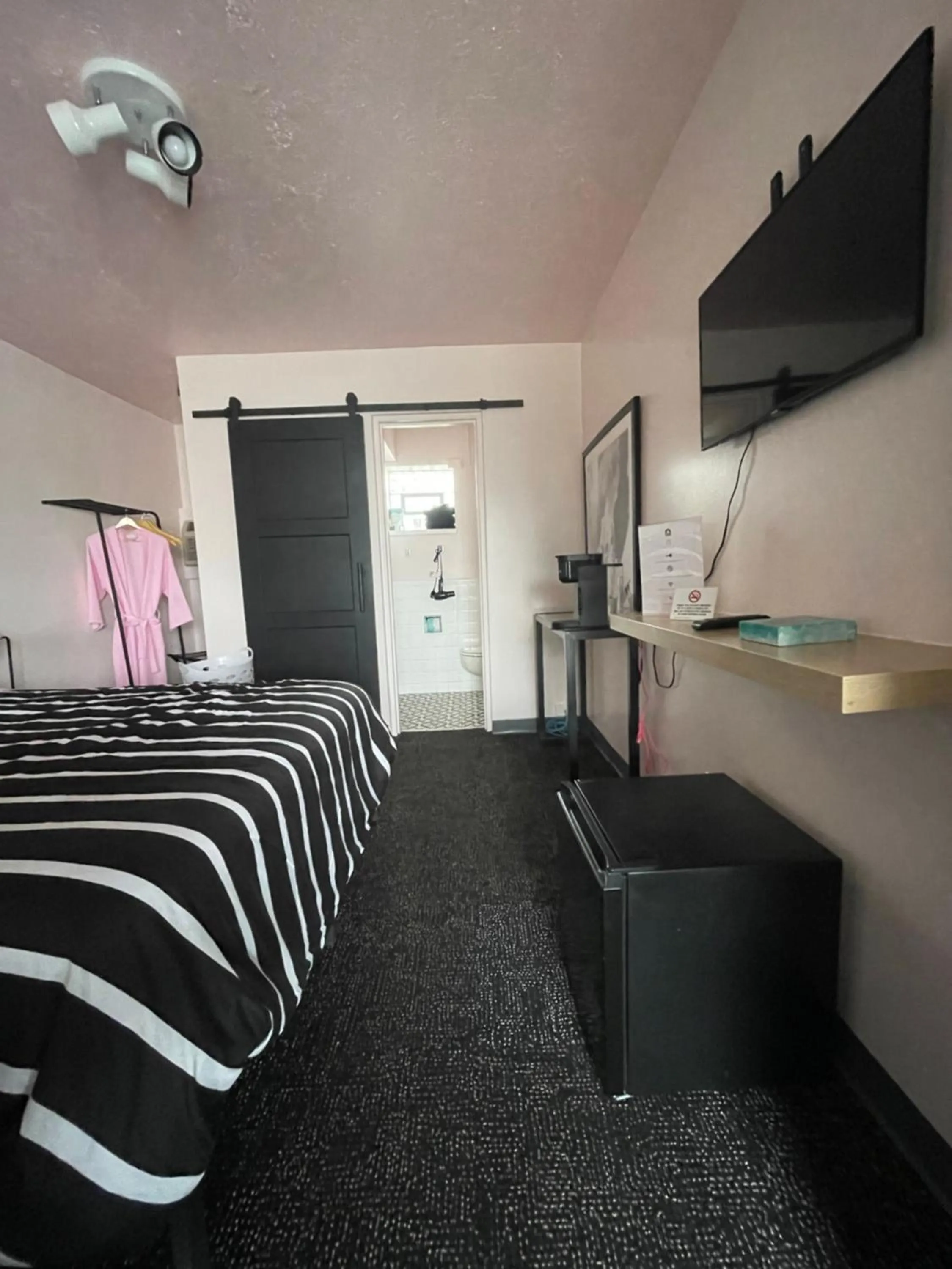 Bed in Rainbow Motel