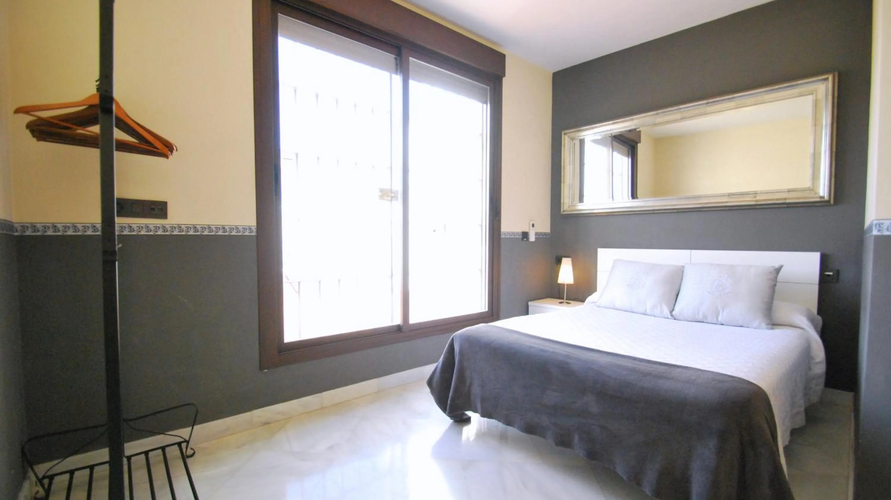 Bedroom, Bed in Living-Sevilla Apartments San Lorenzo