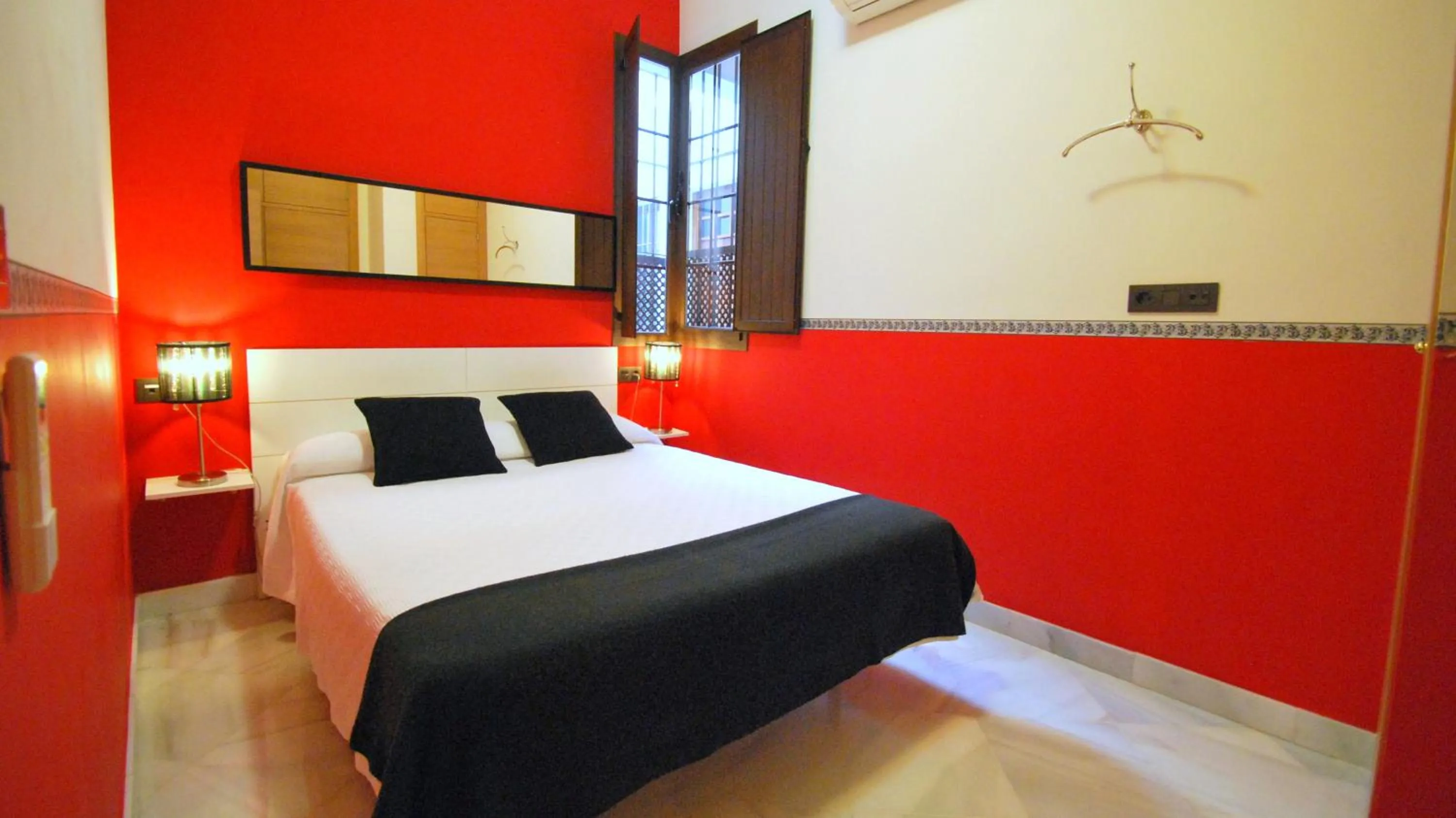 Bedroom, Bed in Living-Sevilla Apartments San Lorenzo