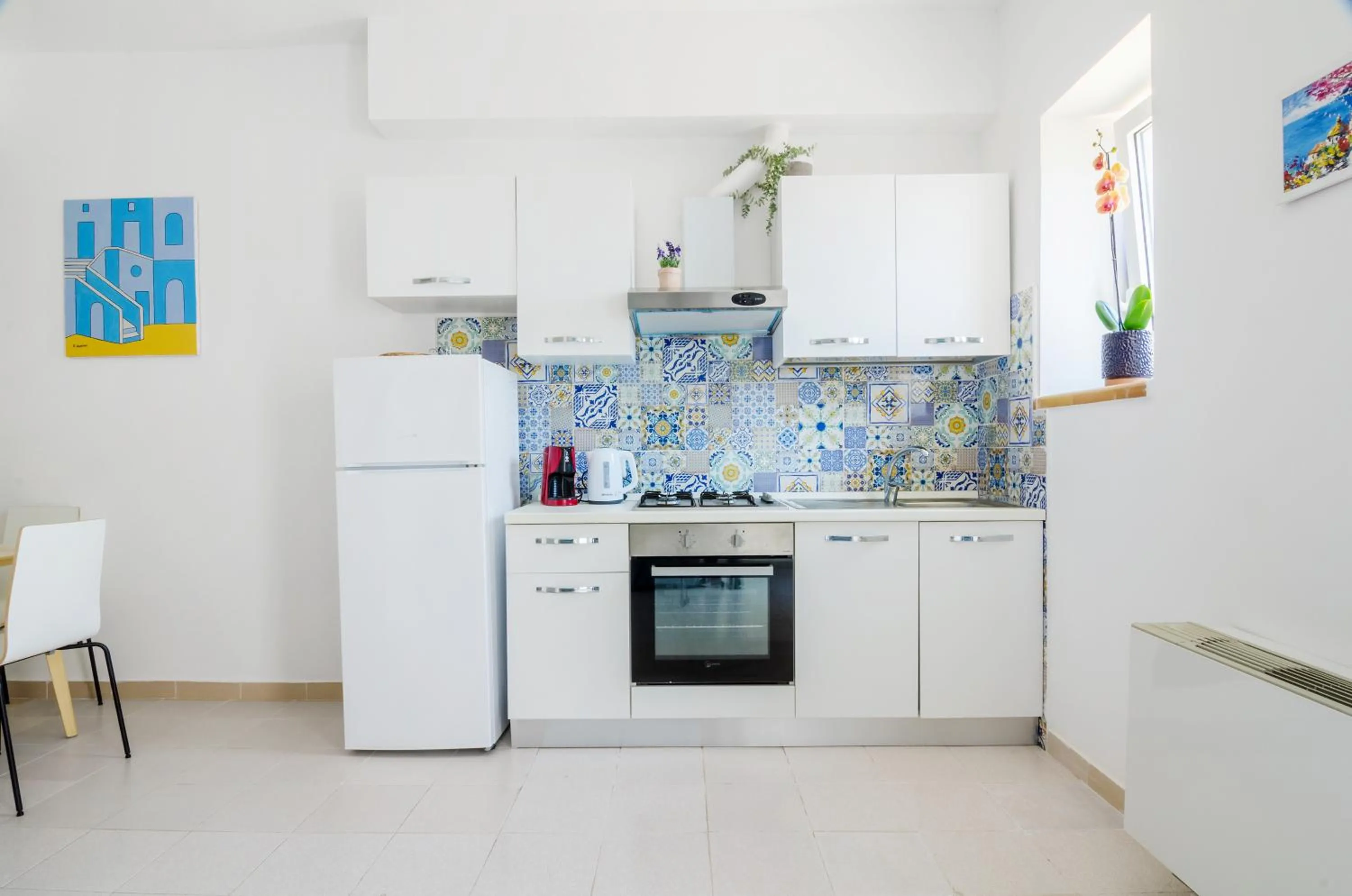 Kitchen or kitchenette in OraBlu Villas
