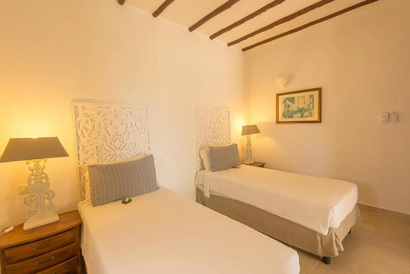 Bed in Konokono Beach Resort and Isaraya Luxury Overwater Villas