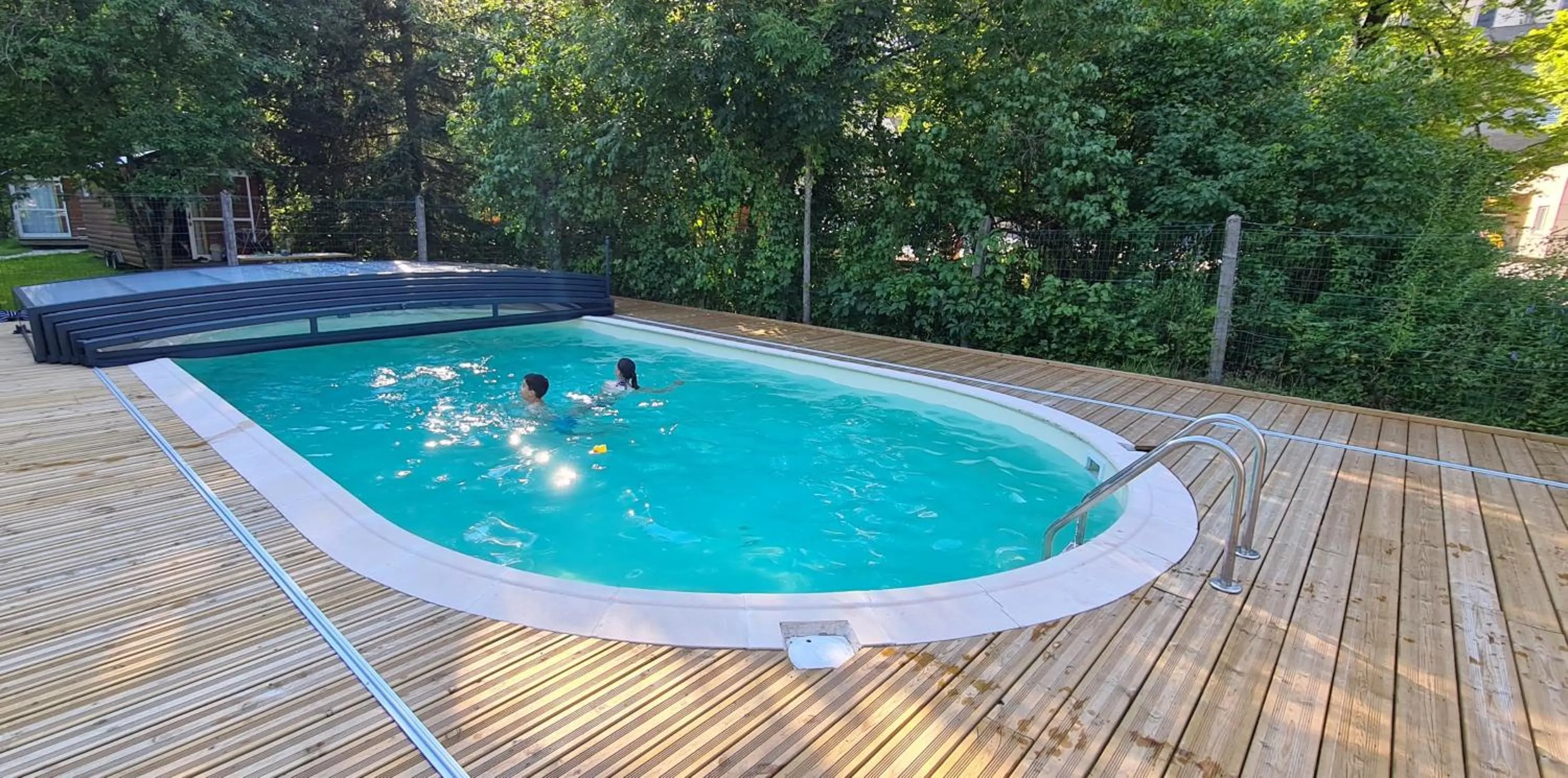 Swimming pool in Auberge de la Rivière