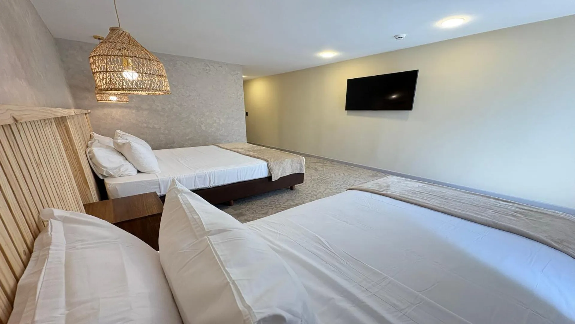 Bed in Hotel Blue Cove by On vacation