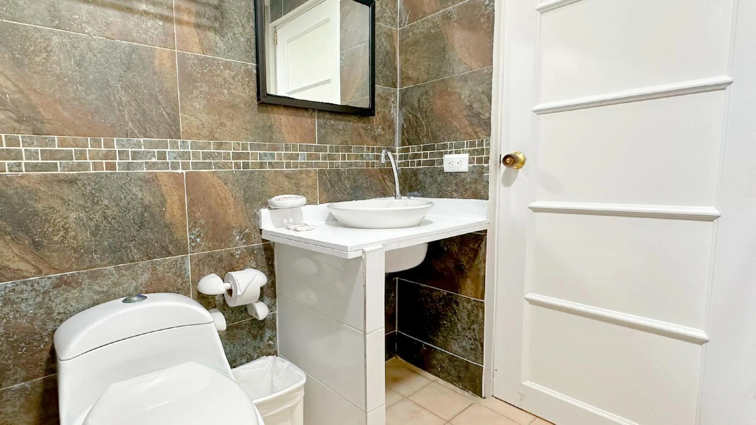 Bathroom in Hotel Blue Cove by On vacation