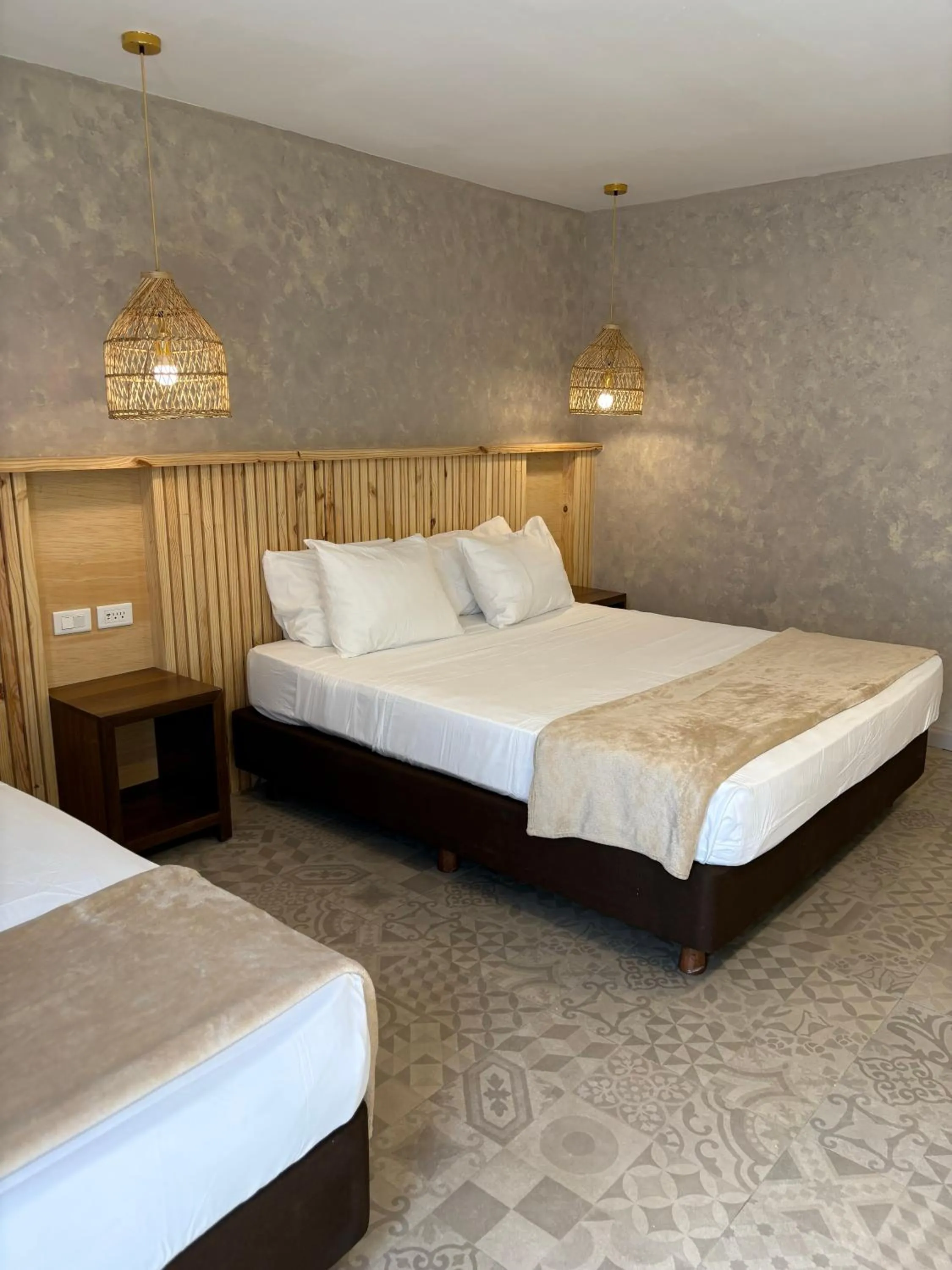 Bed in Hotel Blue Cove by On vacation