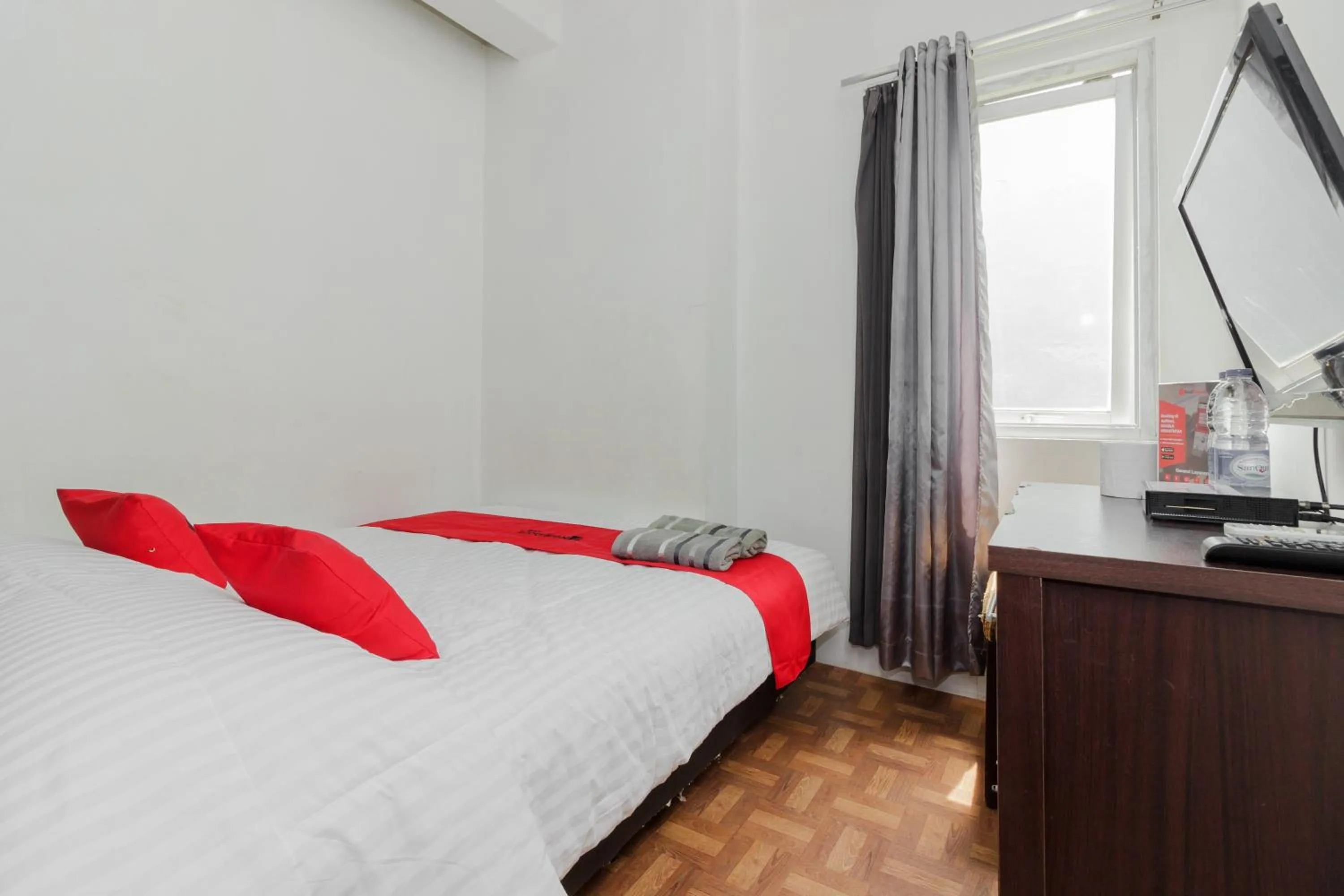 Bedroom in RedDoorz Syariah At Taman Bendungan Asahan