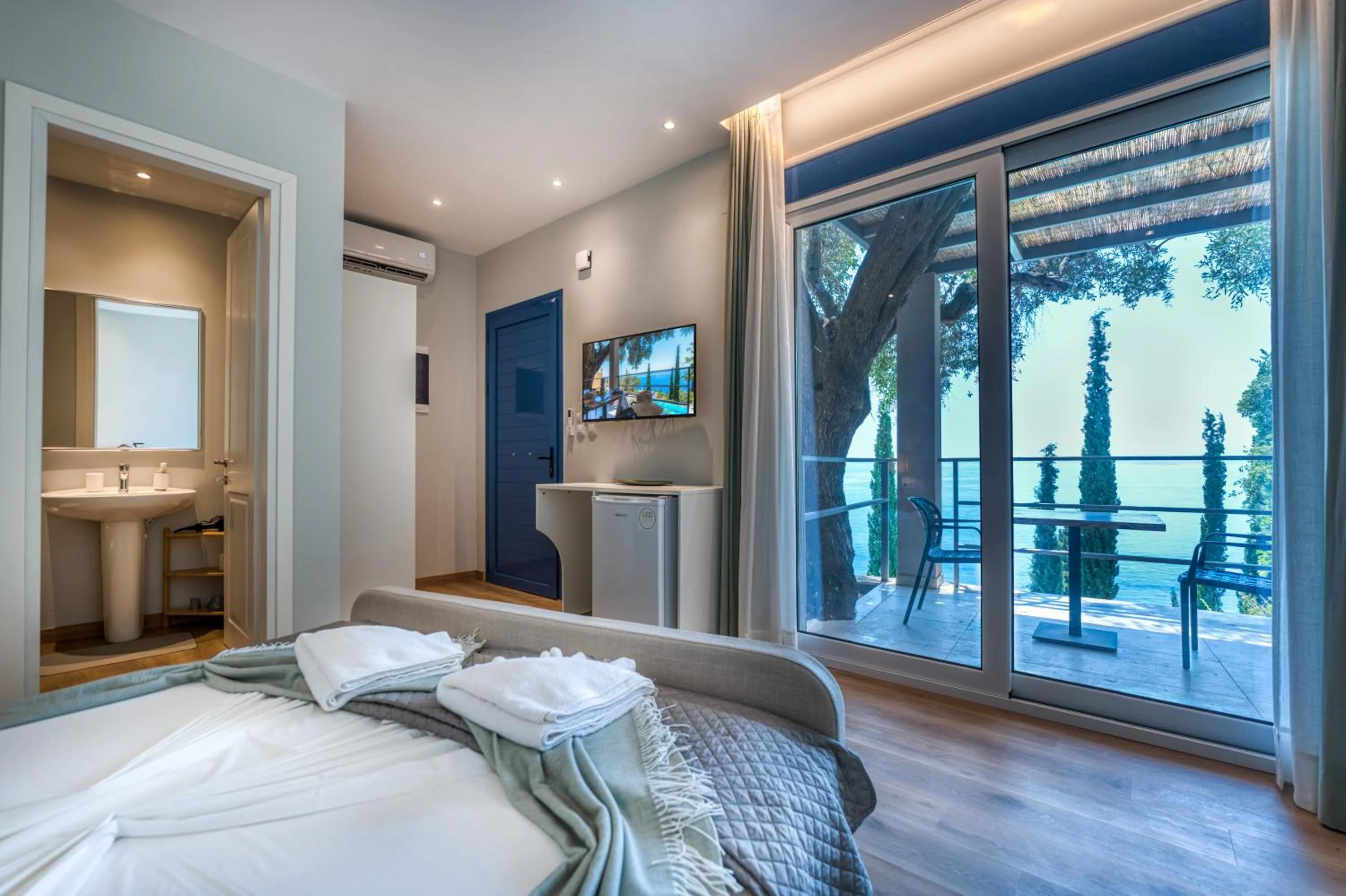 Photo of the whole room, Bed in Corfu Luxury Villas