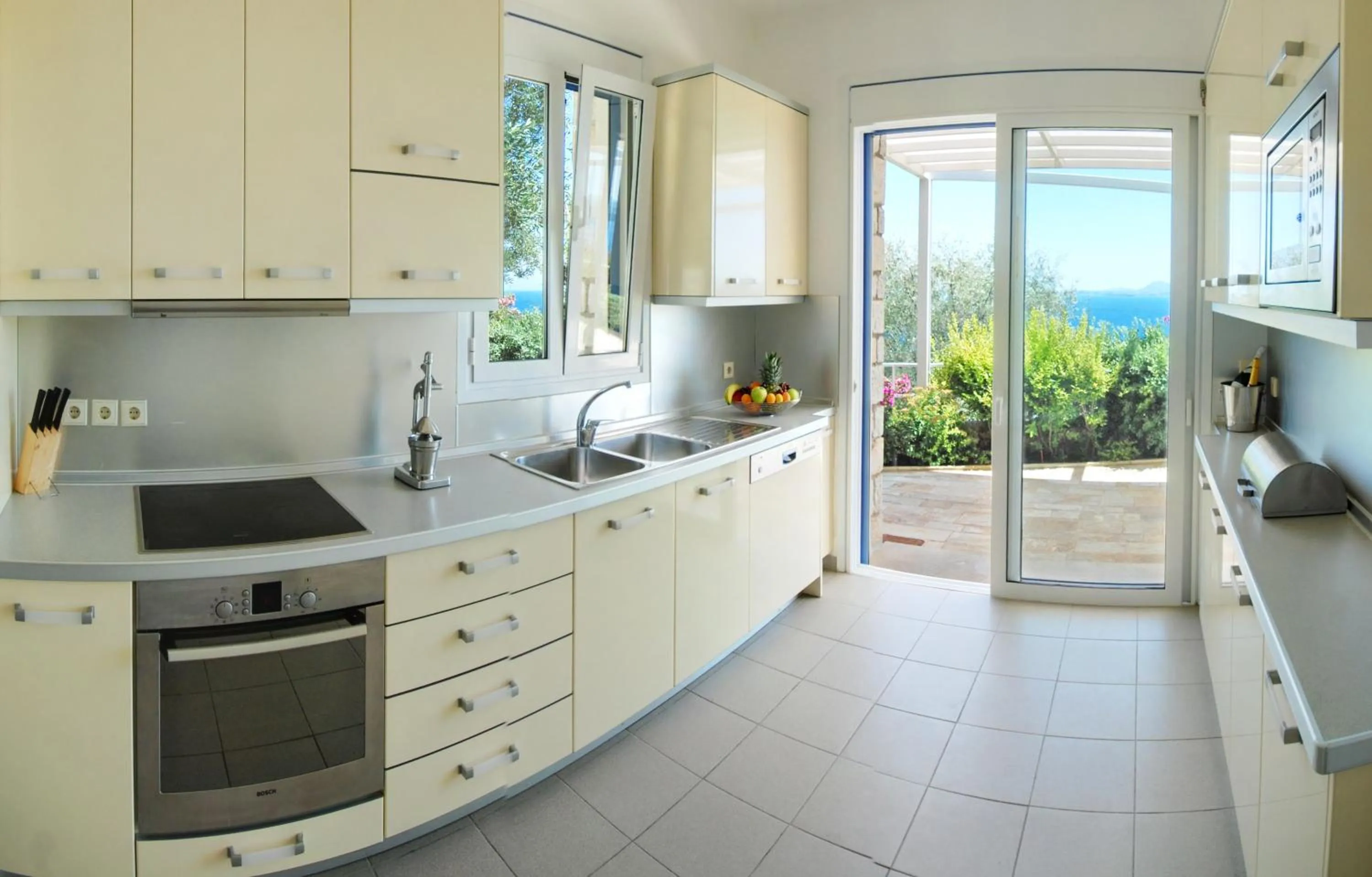 Kitchen or kitchenette in Corfu Luxury Villas